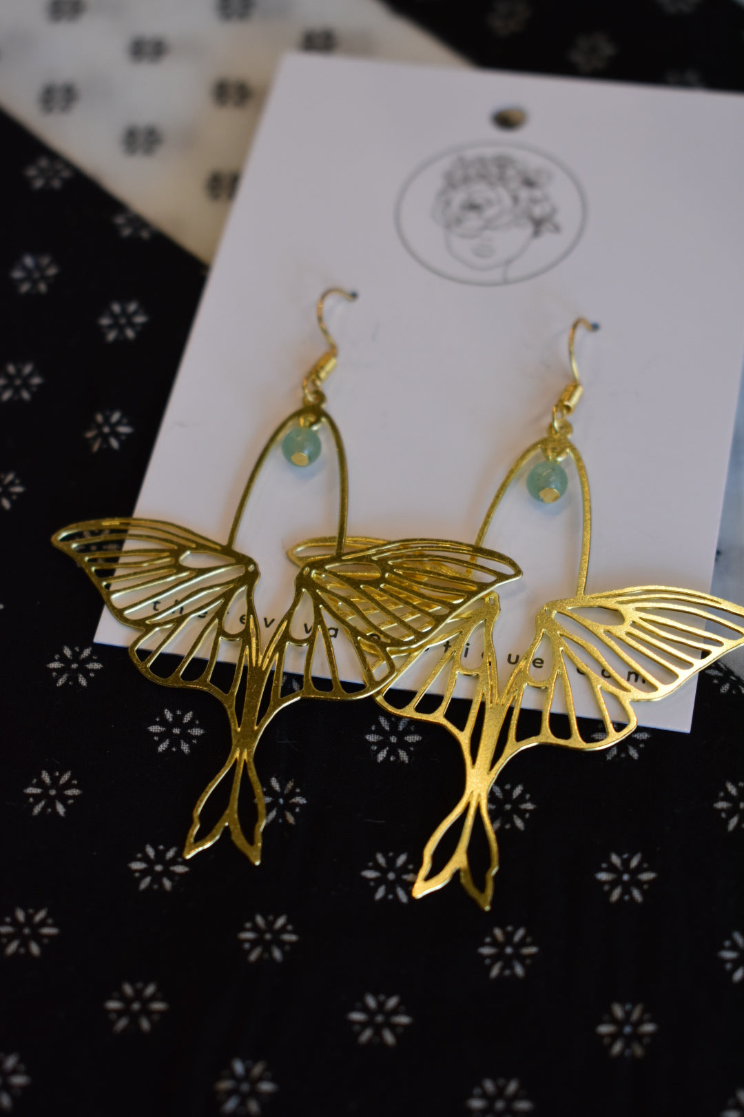 gold lunar moth earrings with aventurine bead nickel free the revival