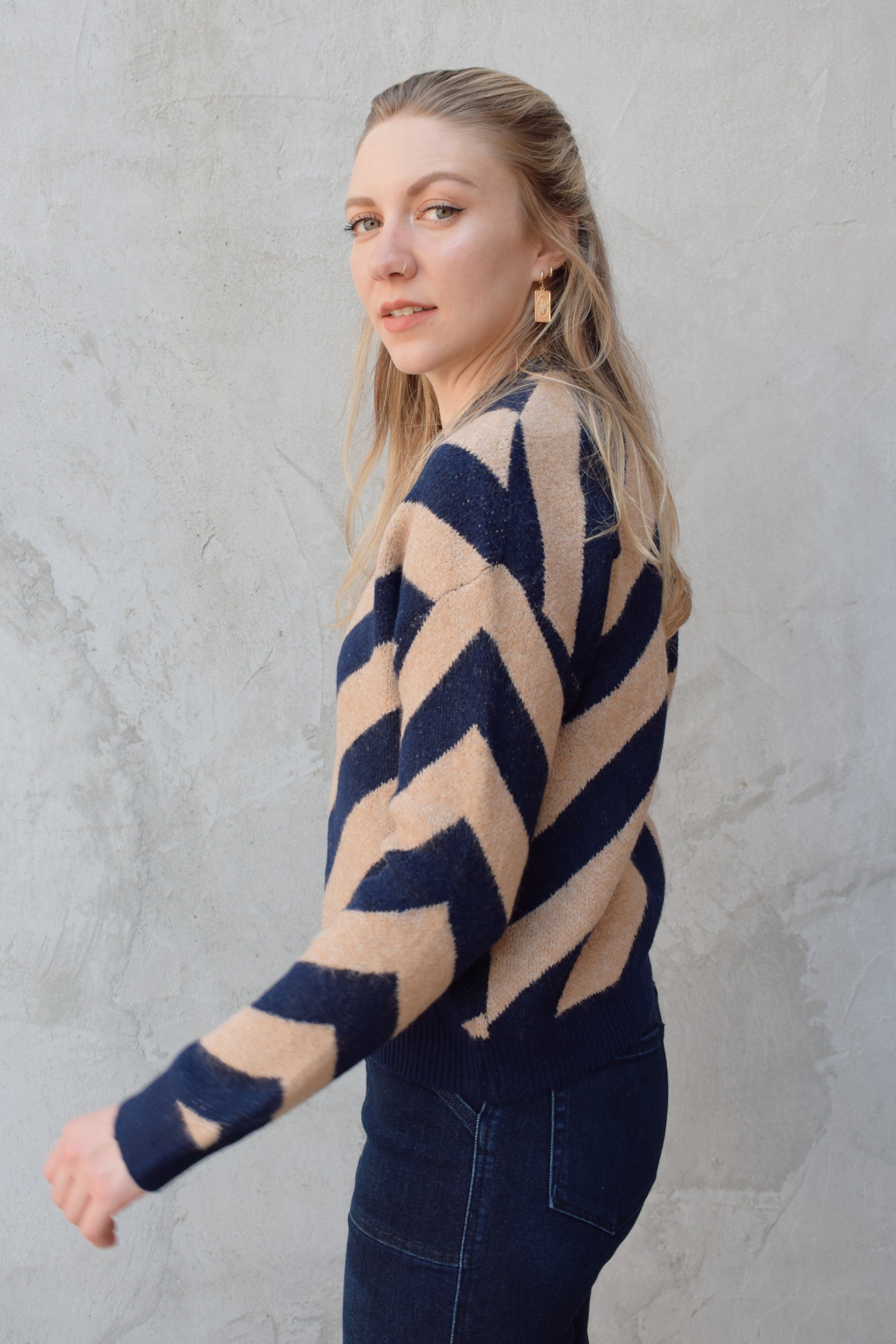 crew neck diagonal striped sweater with drop shoulder full length relaxed fit