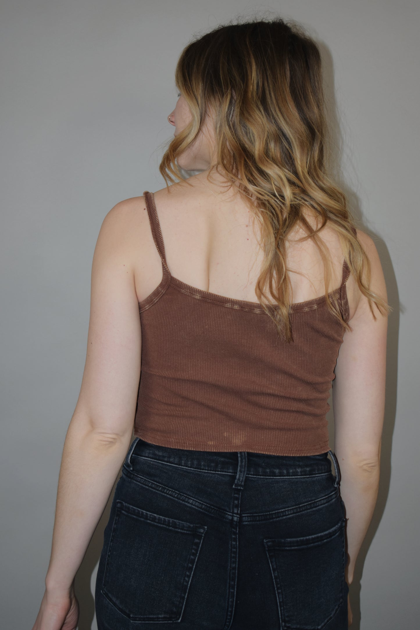 scoop spaghetti strap cropped cami tank with skinny snap placket on front fitted and stretchy semi acid wash