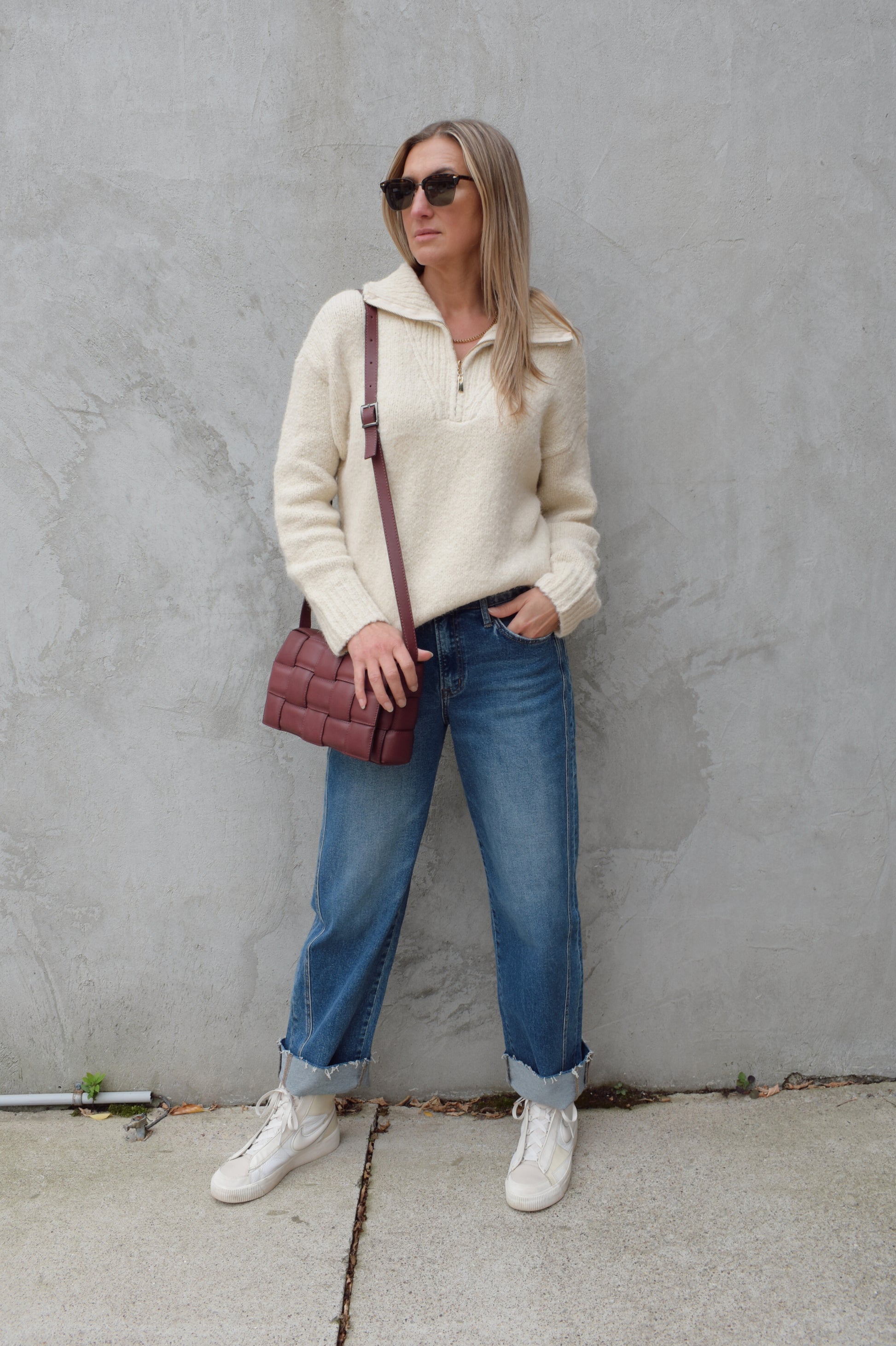 cozy knit blend quarter zip sweater with fold over collar, ribbed hem, full length and loose fit, drop shoulders