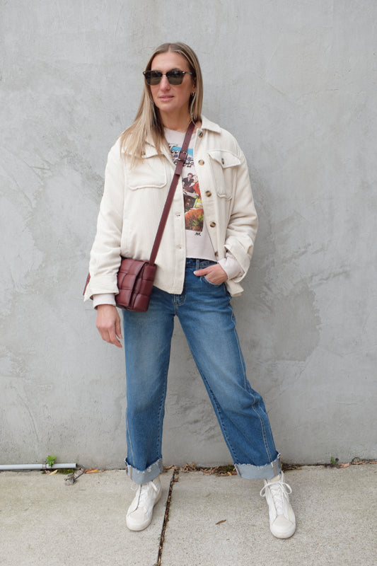 corduroy button down shacket, fur lined, has side pockets, patch breast pockets with fold and button enclosure, full length