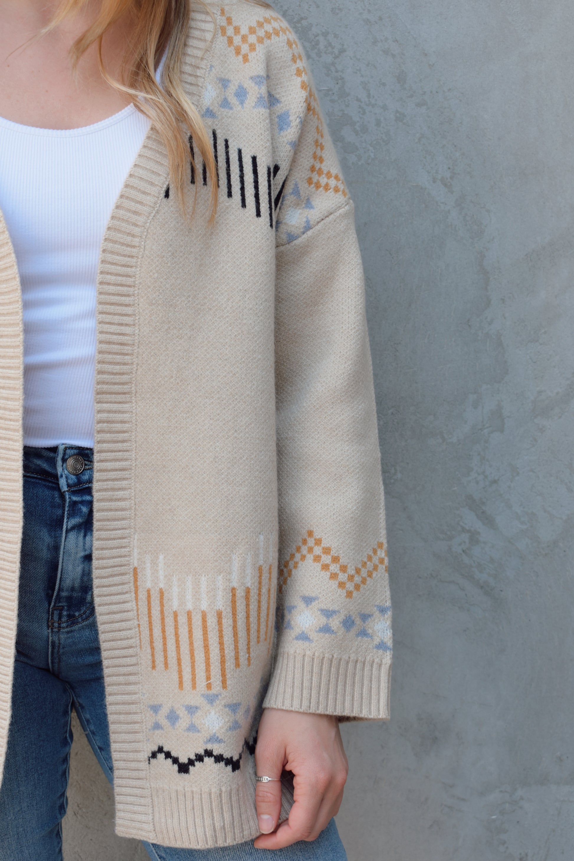 cardigan with western pattern and horses on the back, open front, no pockets, oversized fit, drop shoulder, ribbed hem and cuffs