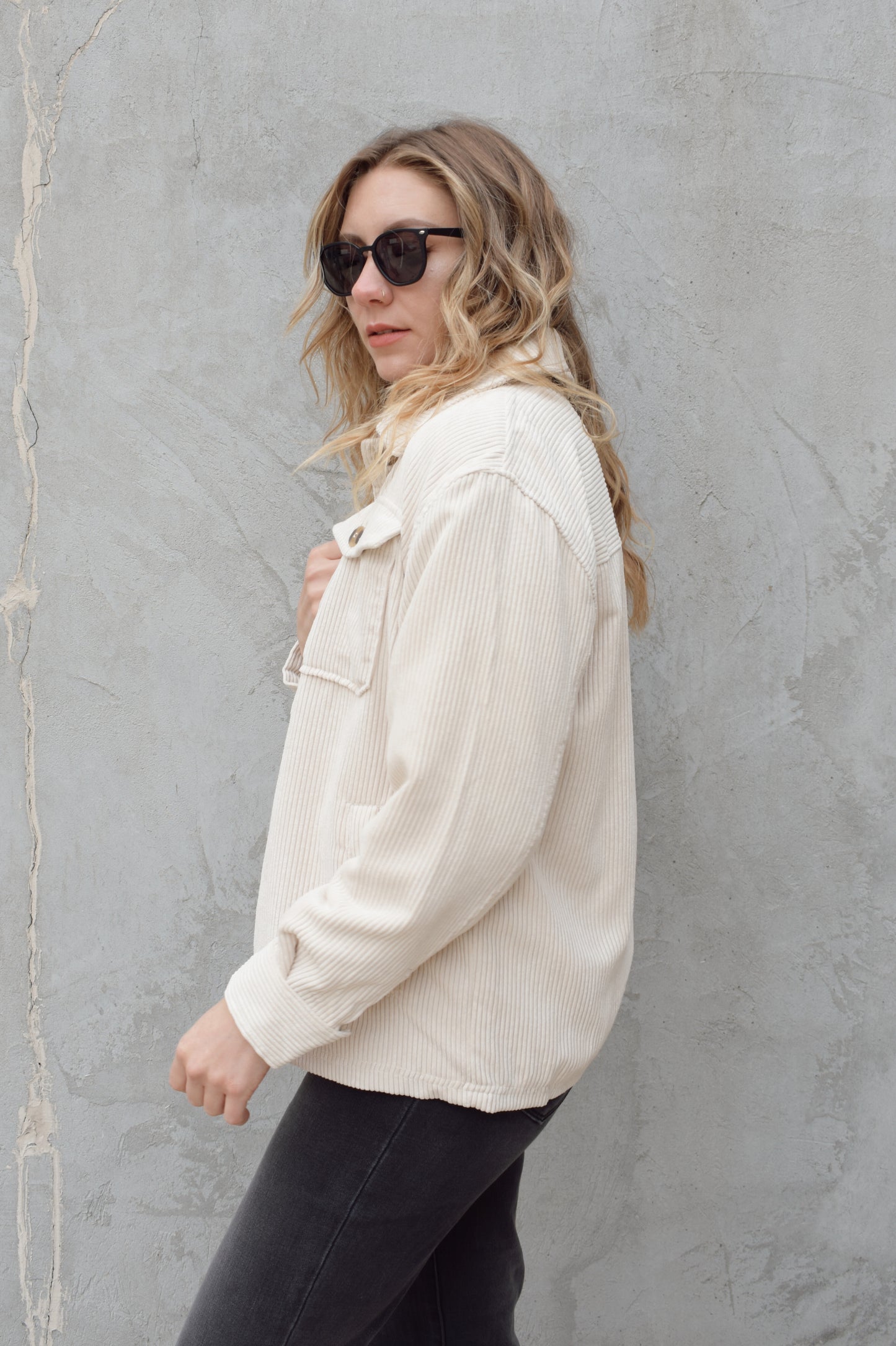 corduroy button down shacket, fur lined, has side pockets, patch breast pockets with fold and button enclosure, full length