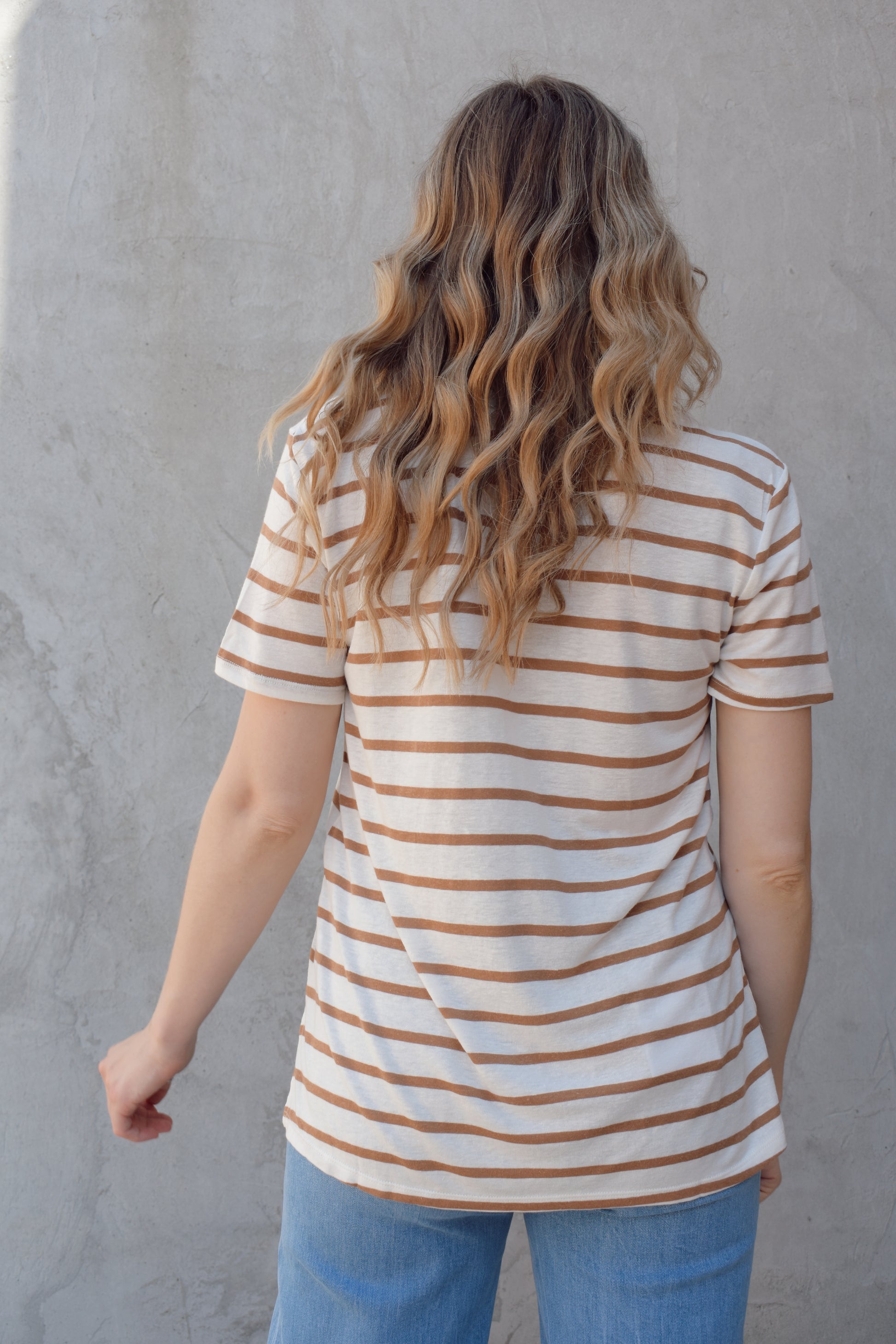 v neck short sleeve relaxed tee full length with slight high low effect with small slit on sides, horizontal stripes