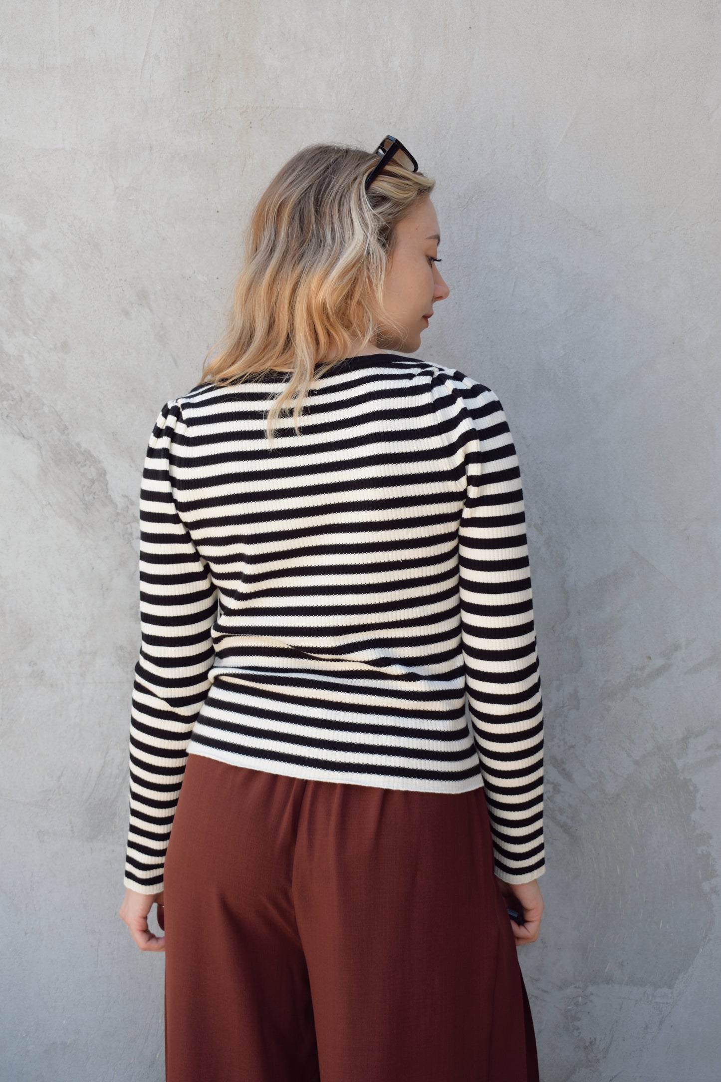 black and white horizontal striped long sleeve sweater with boat neckline and gathered puff shoulders (very slight), fitted, full length, solid black around neckline
