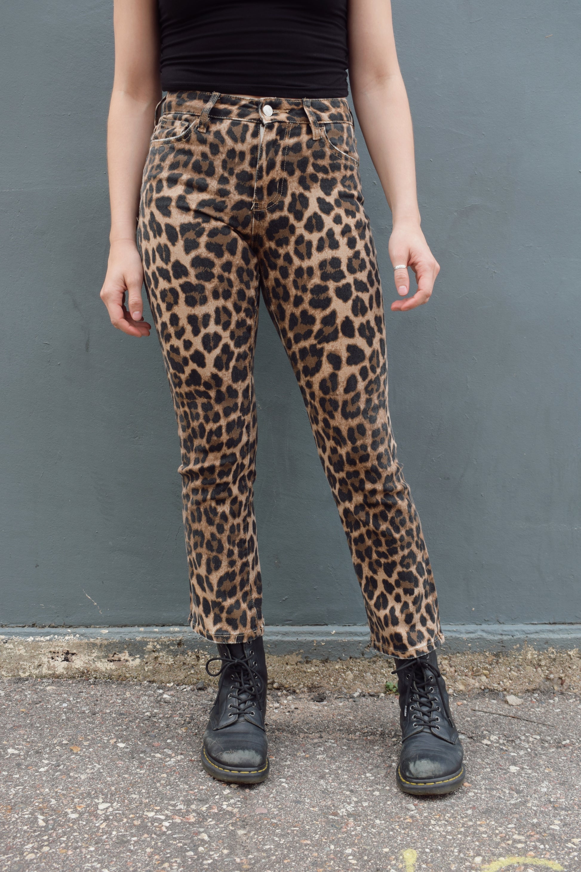high rise cropped kick flare leopard print jeans, stretch denim, no holes, zip and button enclosure, statement jeans, animal print, front and back pockets, has beltloops