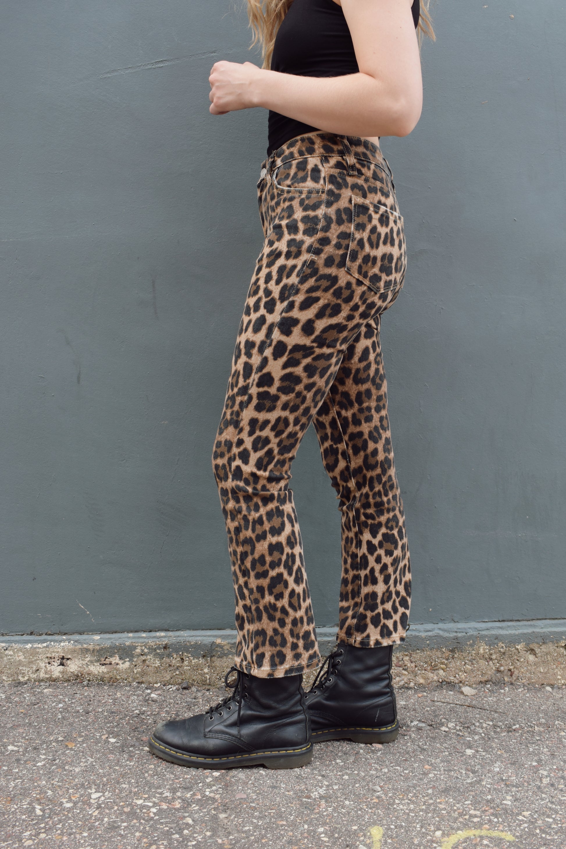 high rise cropped kick flare leopard print jeans, stretch denim, no holes, zip and button enclosure, statement jeans, animal print, front and back pockets, has beltloops