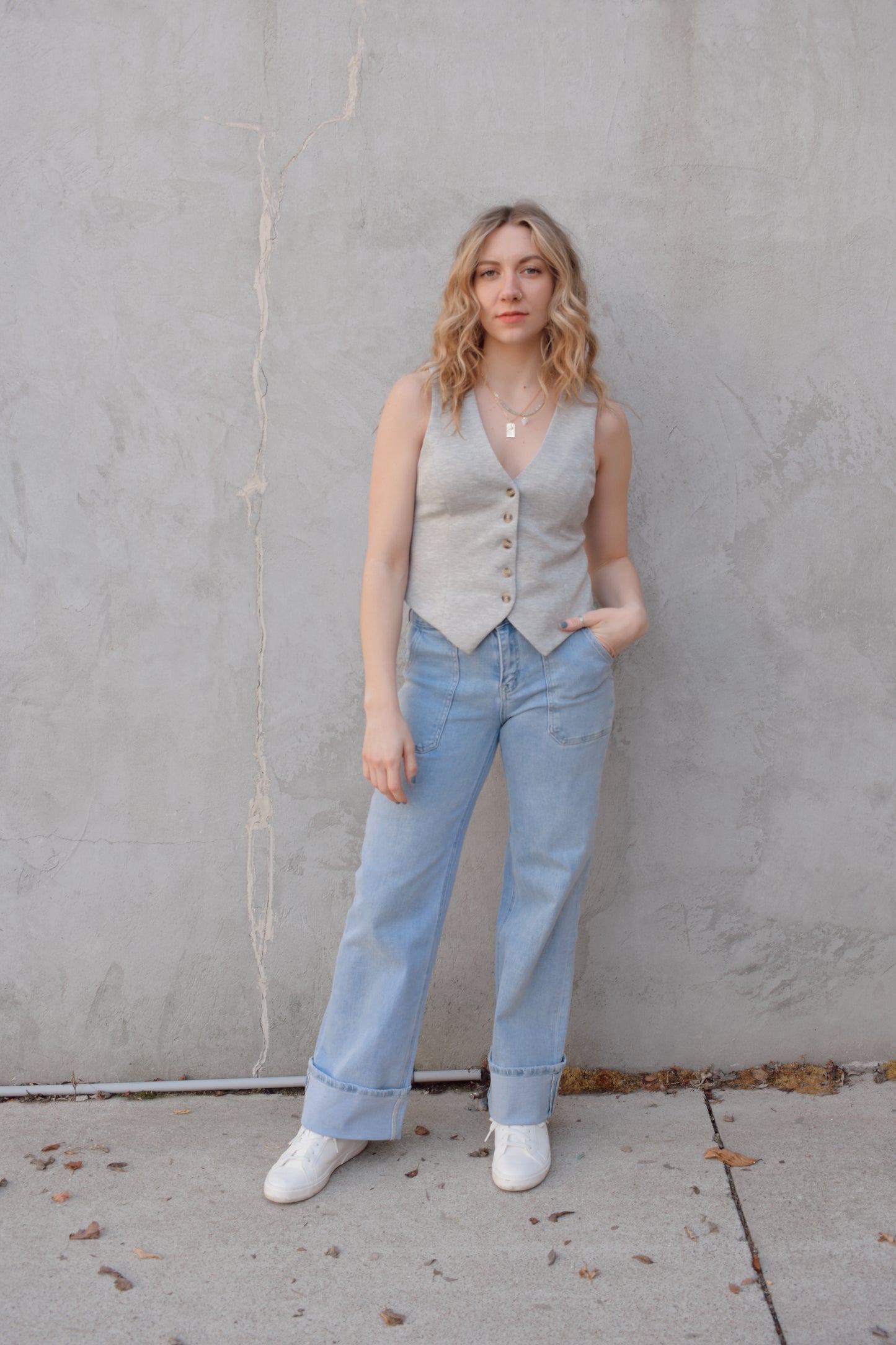 sweatshirt style material fitted button down vest