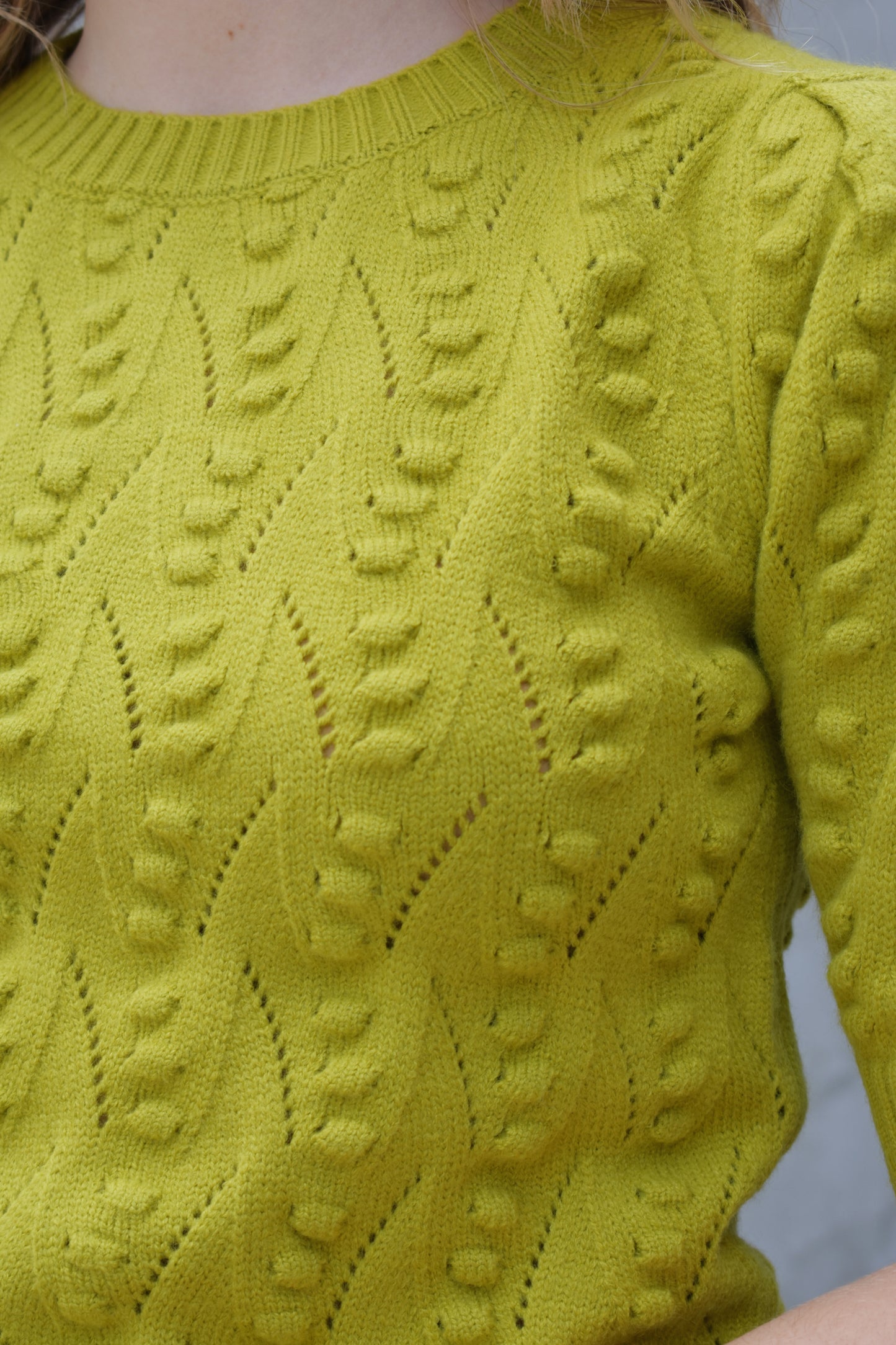 short sleeve crew neck sweater with  popcorn knit pointelle design and ribbed texture on cuffs hem and neckline chartreuse color straight fit