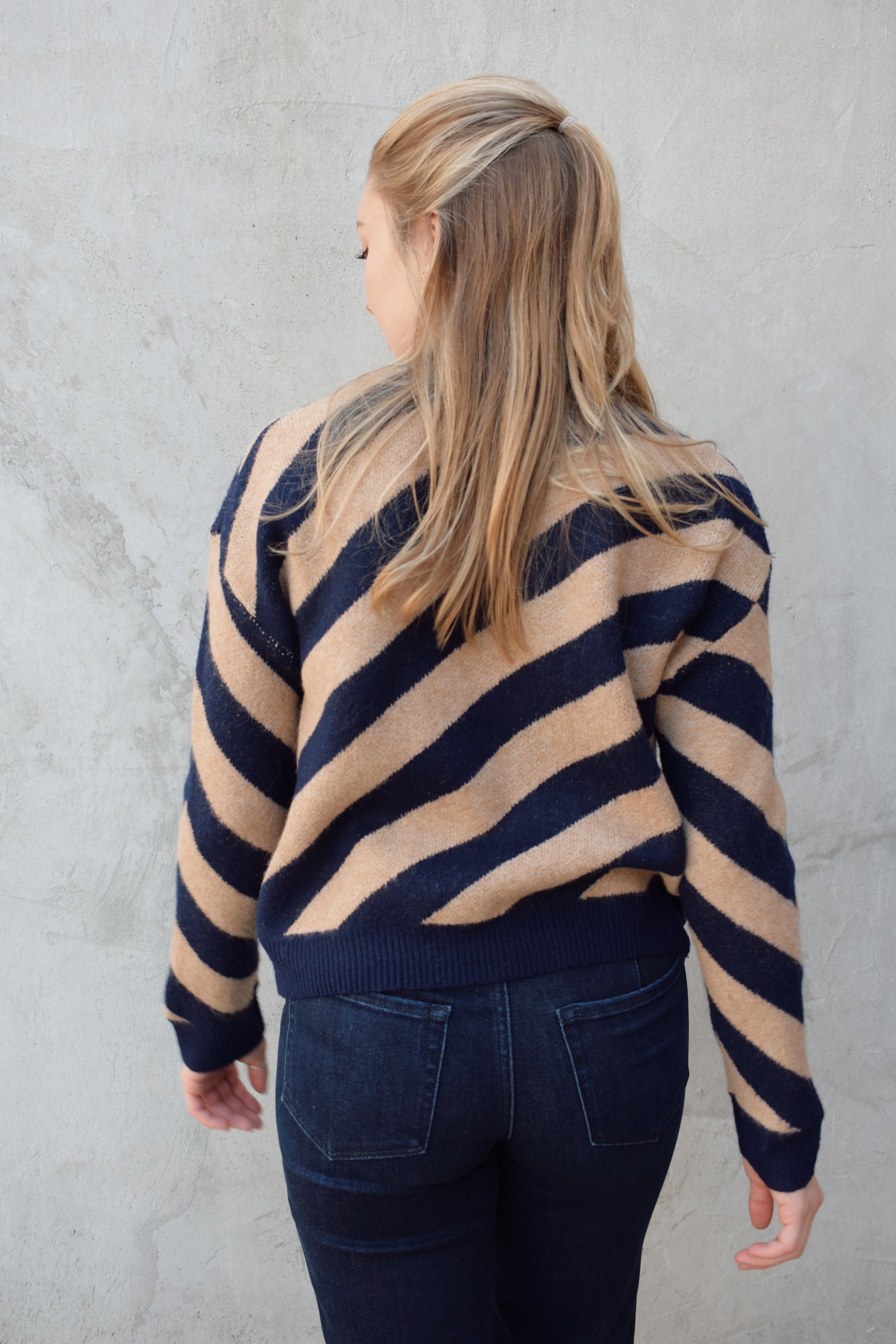 crew neck diagonal striped sweater with drop shoulder full length relaxed fit