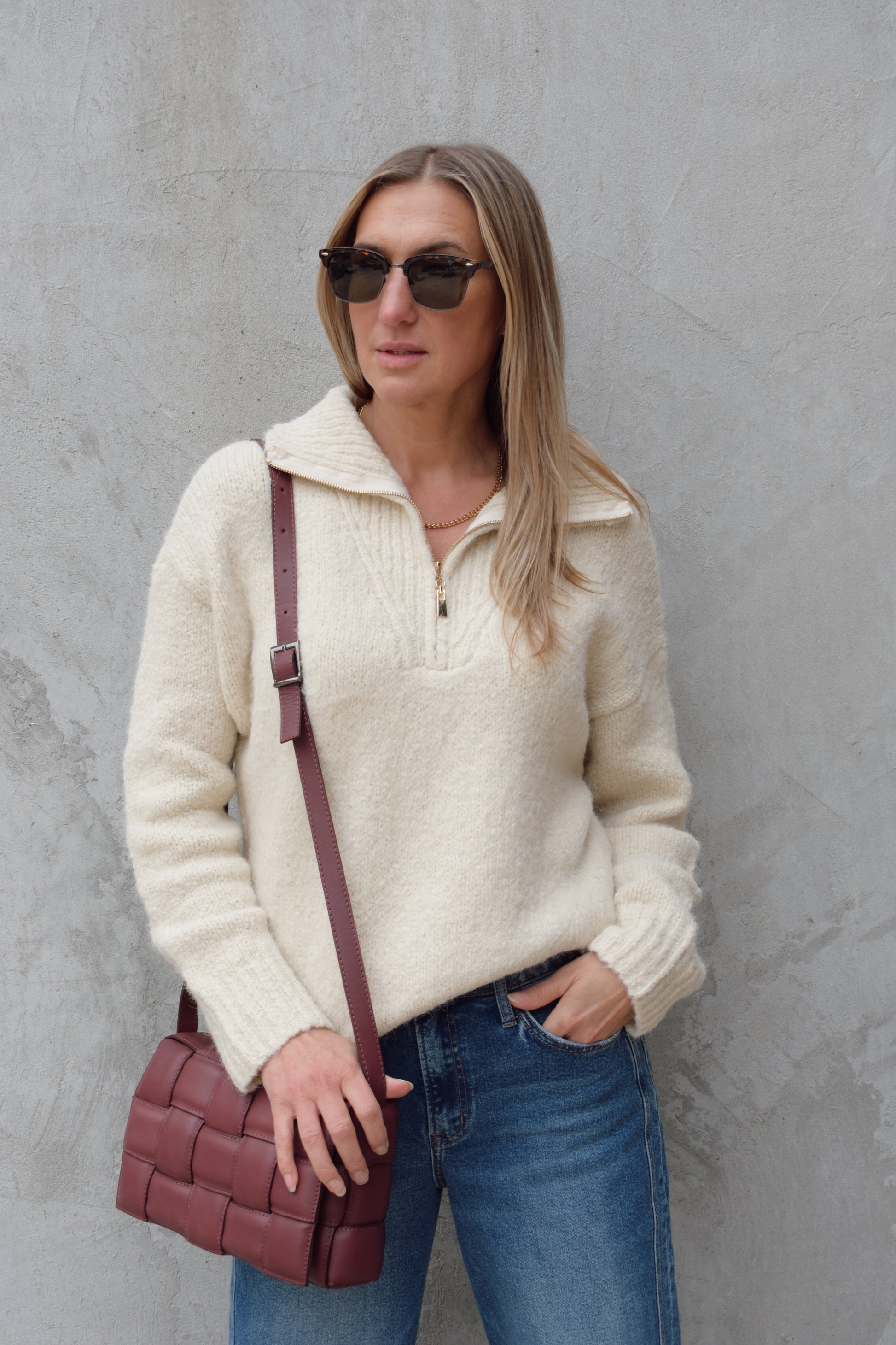 cozy knit blend quarter zip sweater with fold over collar, ribbed hem, full length and loose fit, drop shoulders