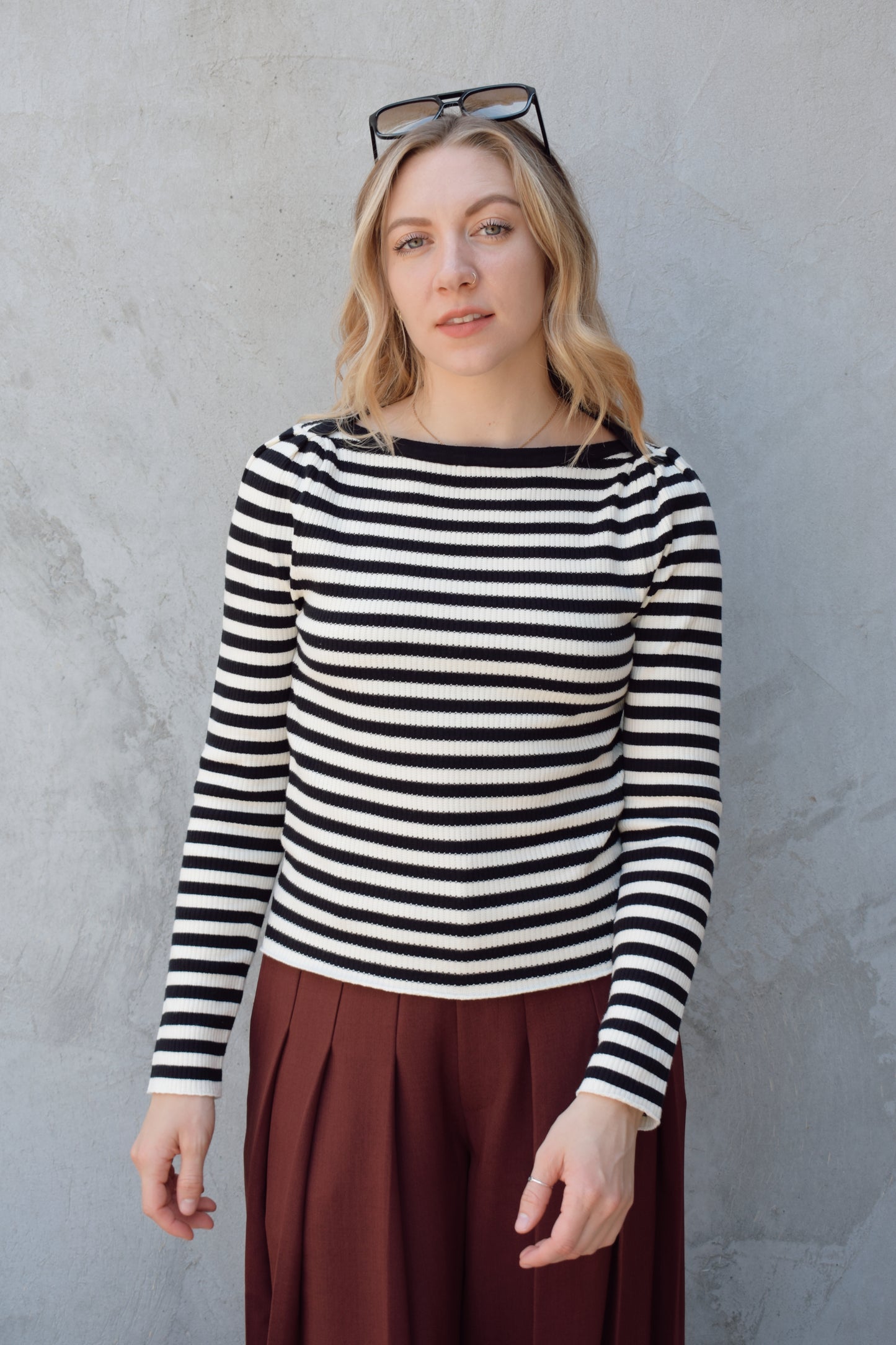 black and white horizontal striped long sleeve sweater with boat neckline and gathered puff shoulders (very slight), fitted, full length, solid black around neckline