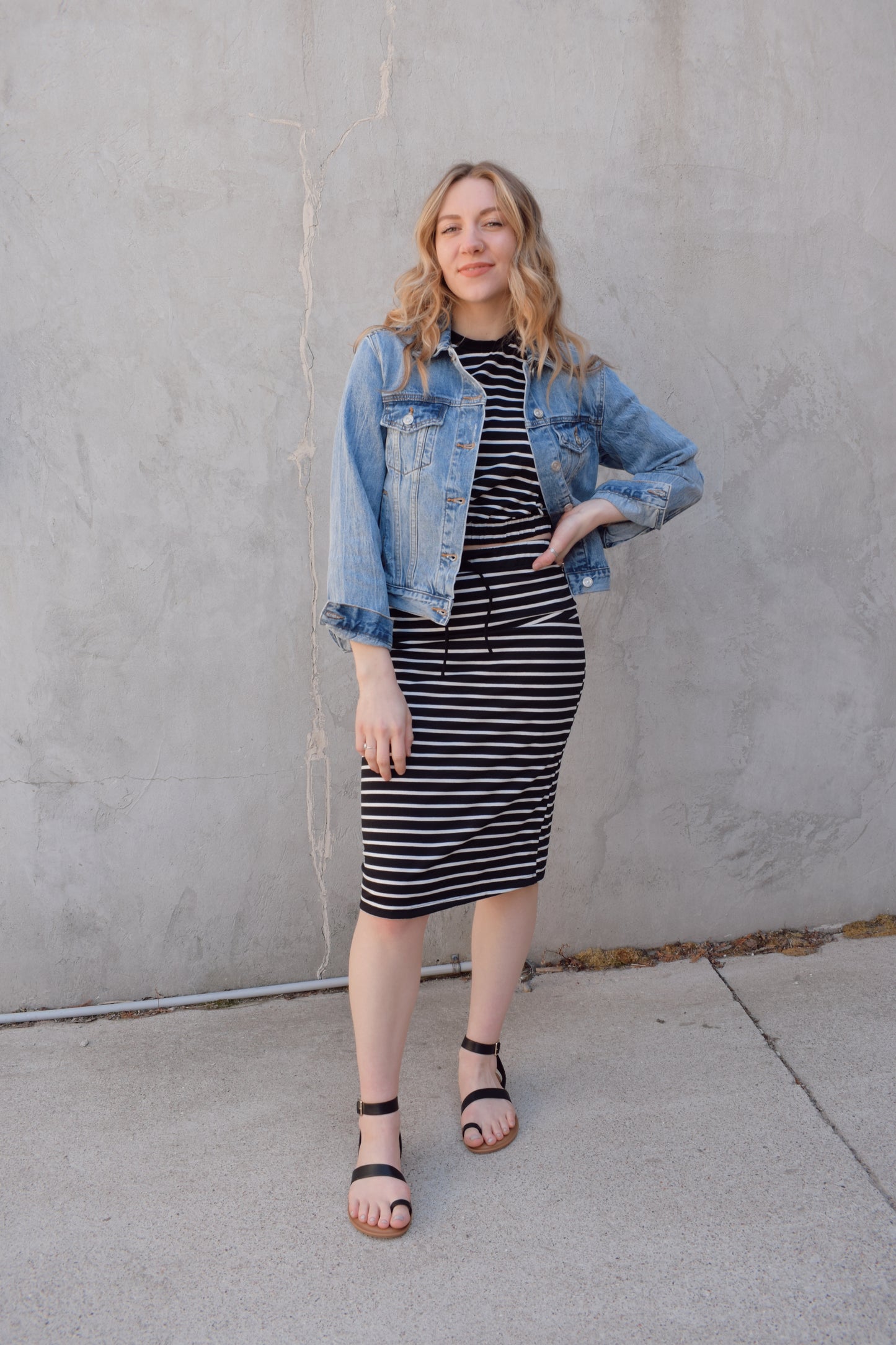 medium wash distressed jean jacket staple for wardrobe relaxed fit full length