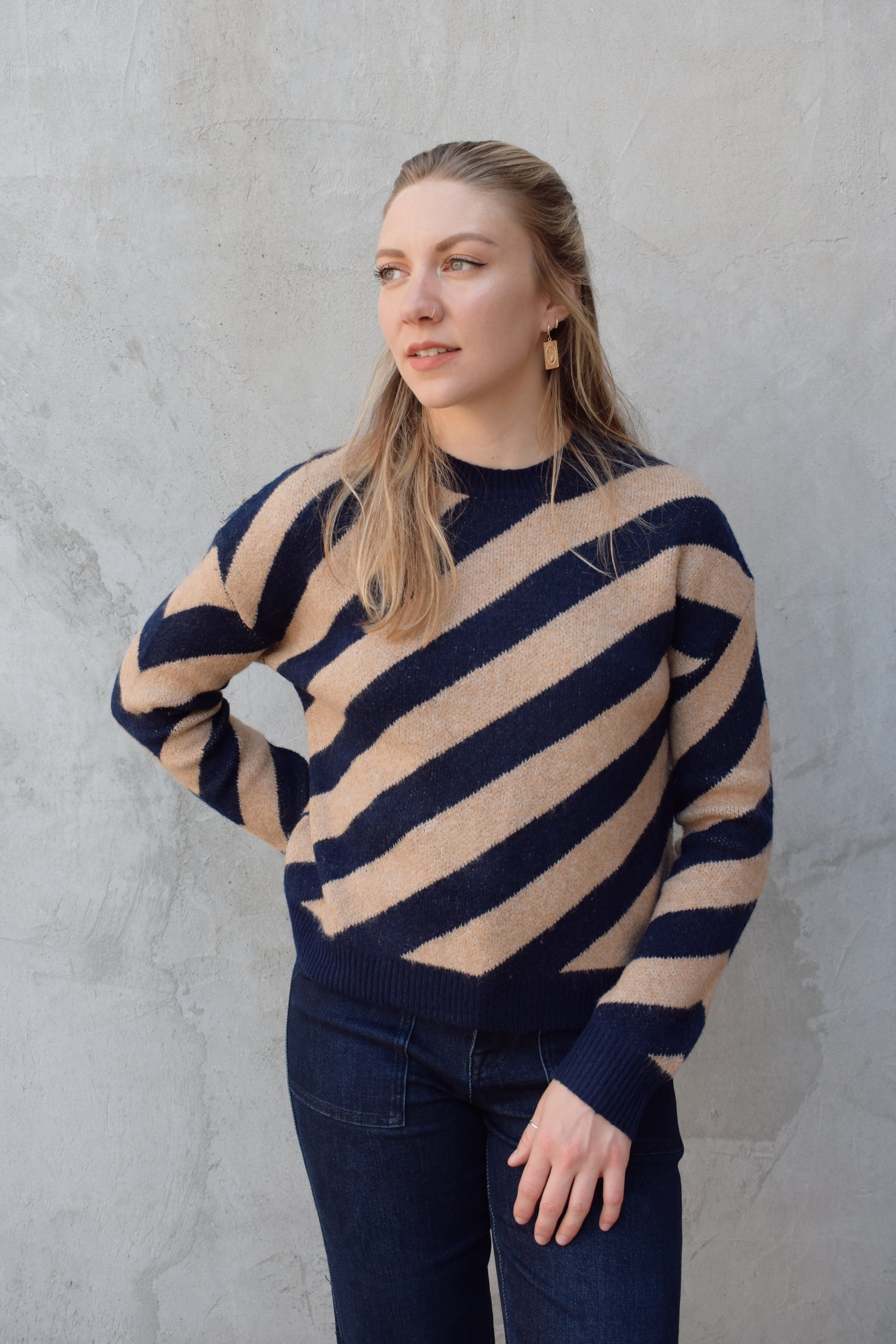 crew neck diagonal striped sweater with drop shoulder full length relaxed fit