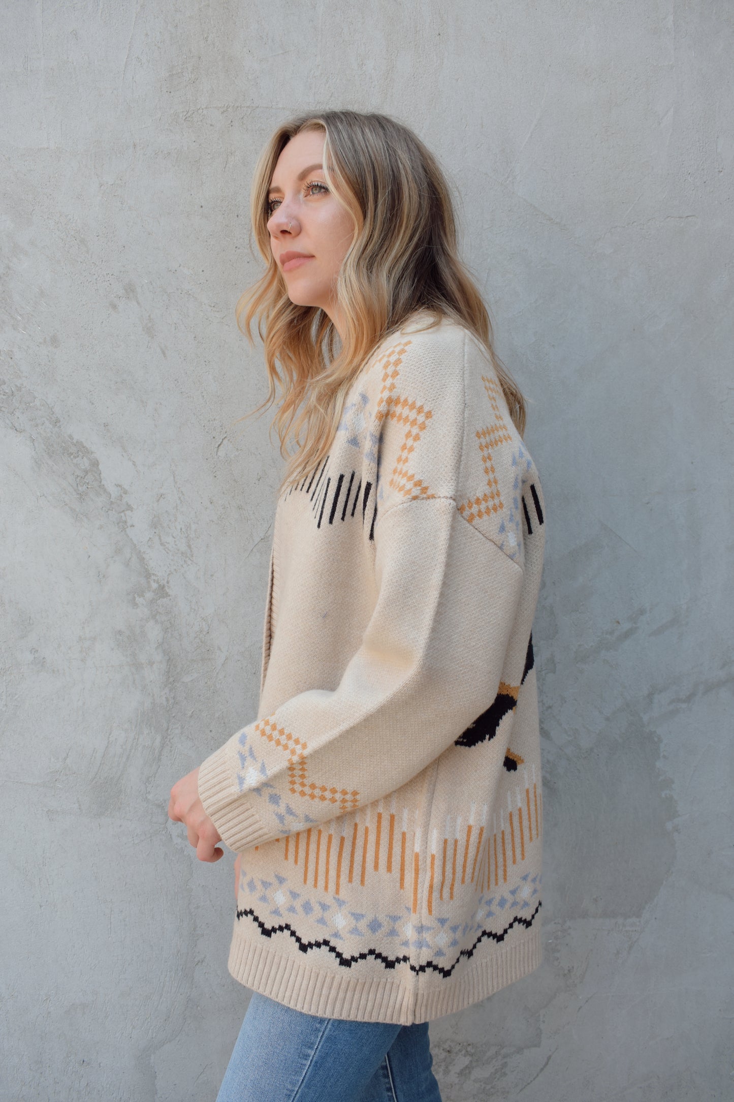 cardigan with western pattern and horses on the back, open front, no pockets, oversized fit, drop shoulder, ribbed hem and cuffs