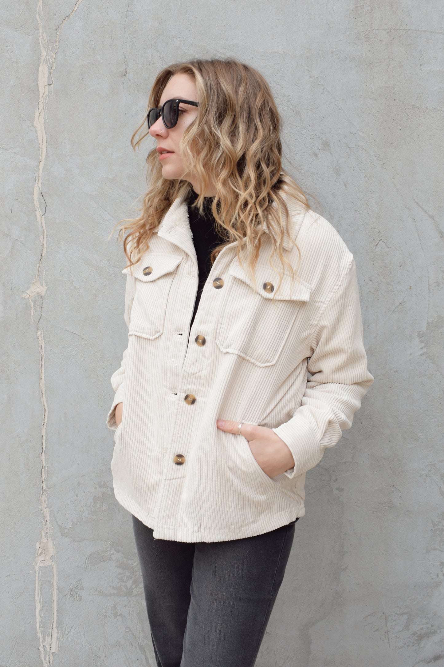 corduroy button down shacket, fur lined, has side pockets, patch breast pockets with fold and button enclosure, full length