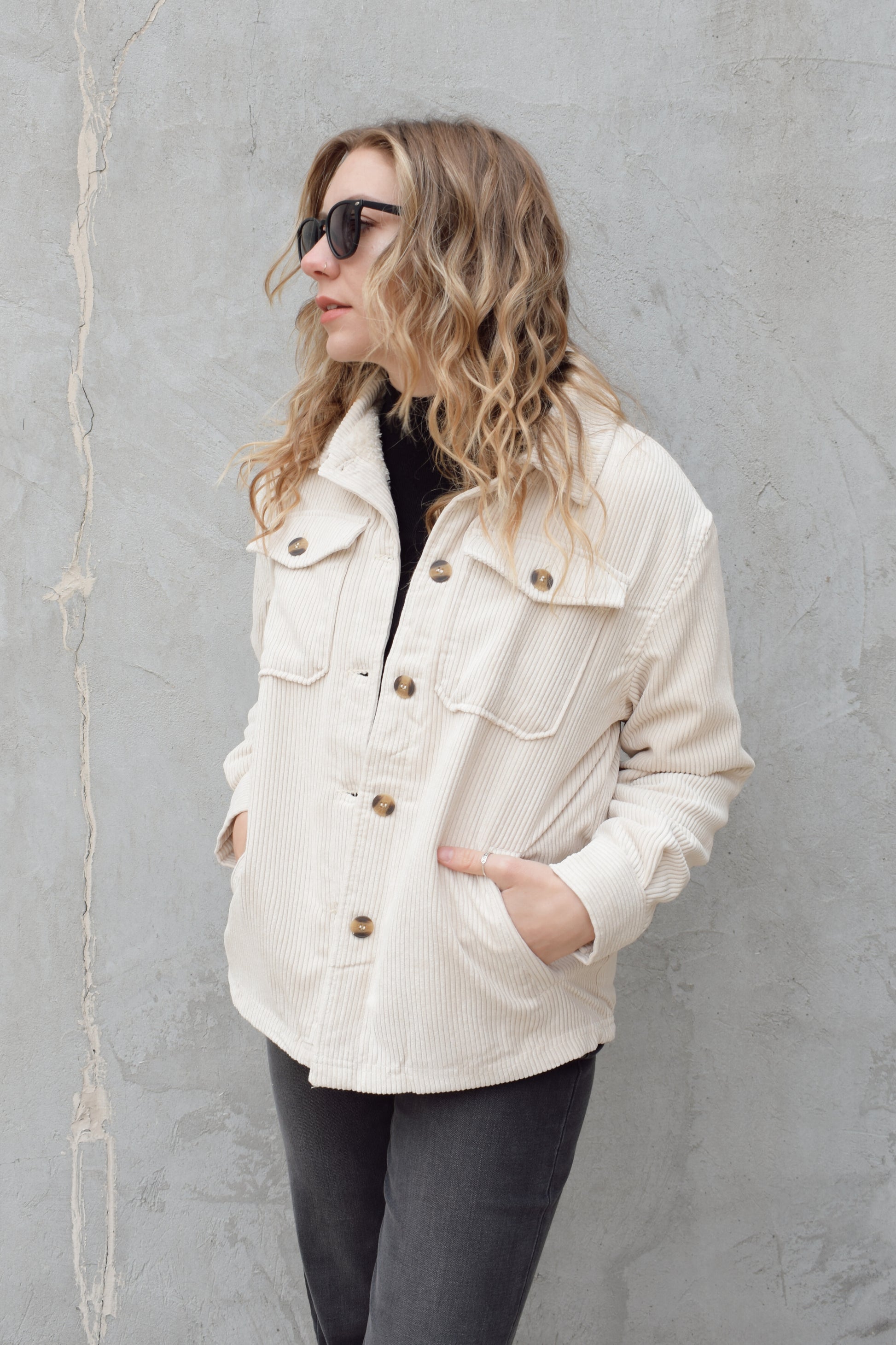 corduroy button down shacket, fur lined, has side pockets, patch breast pockets with fold and button enclosure, full length