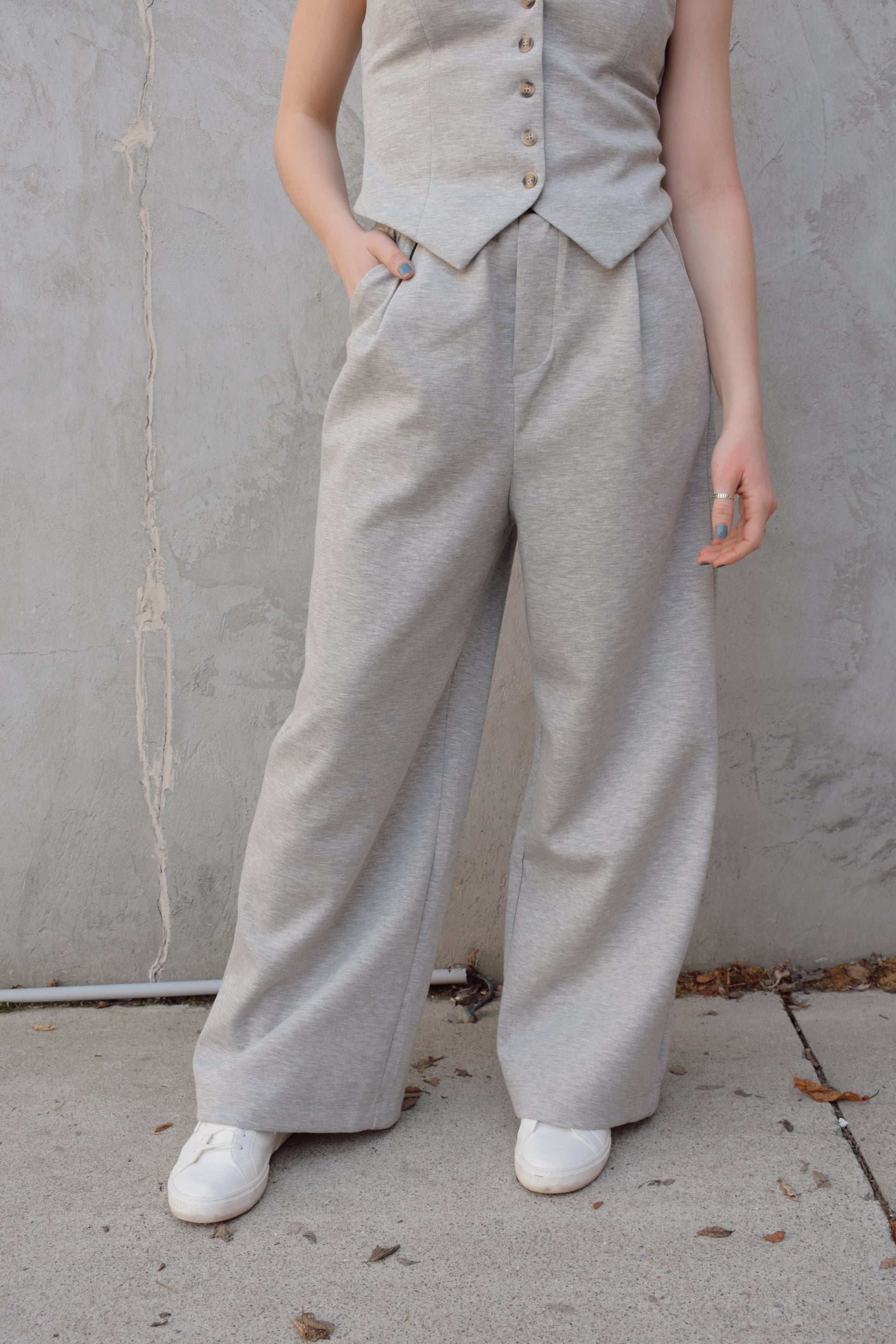 sweatpants style peated trousers with elastic waistband, pockets, fake back pockets, wide leg full length