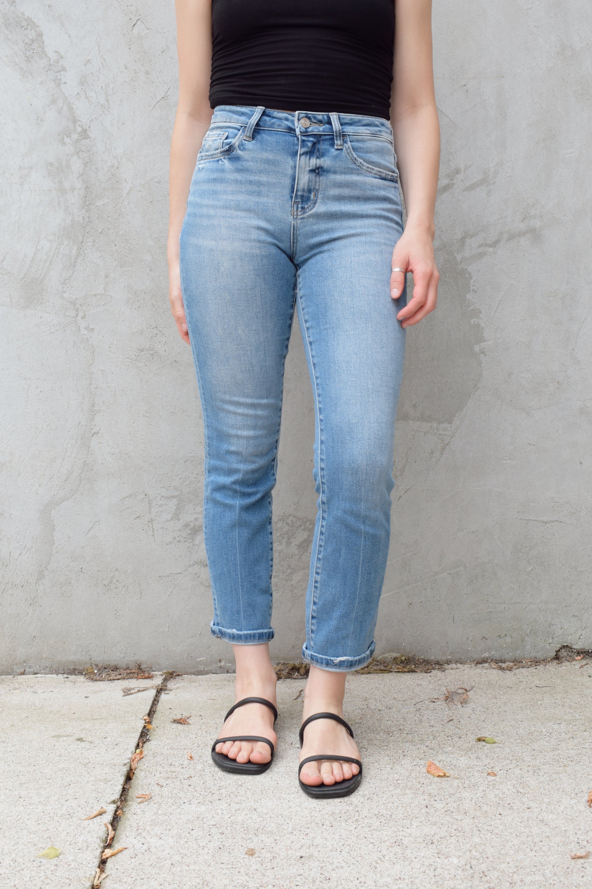 light wash stretch denim slim straight jeans no holes zip and button enclosure high rise