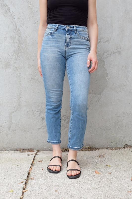 light wash stretch denim slim straight jeans no holes zip and button enclosure high rise