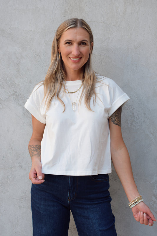 lightweight boxy style t-shirt crew neck with cuffed sleeves, hits at hips, staple basic