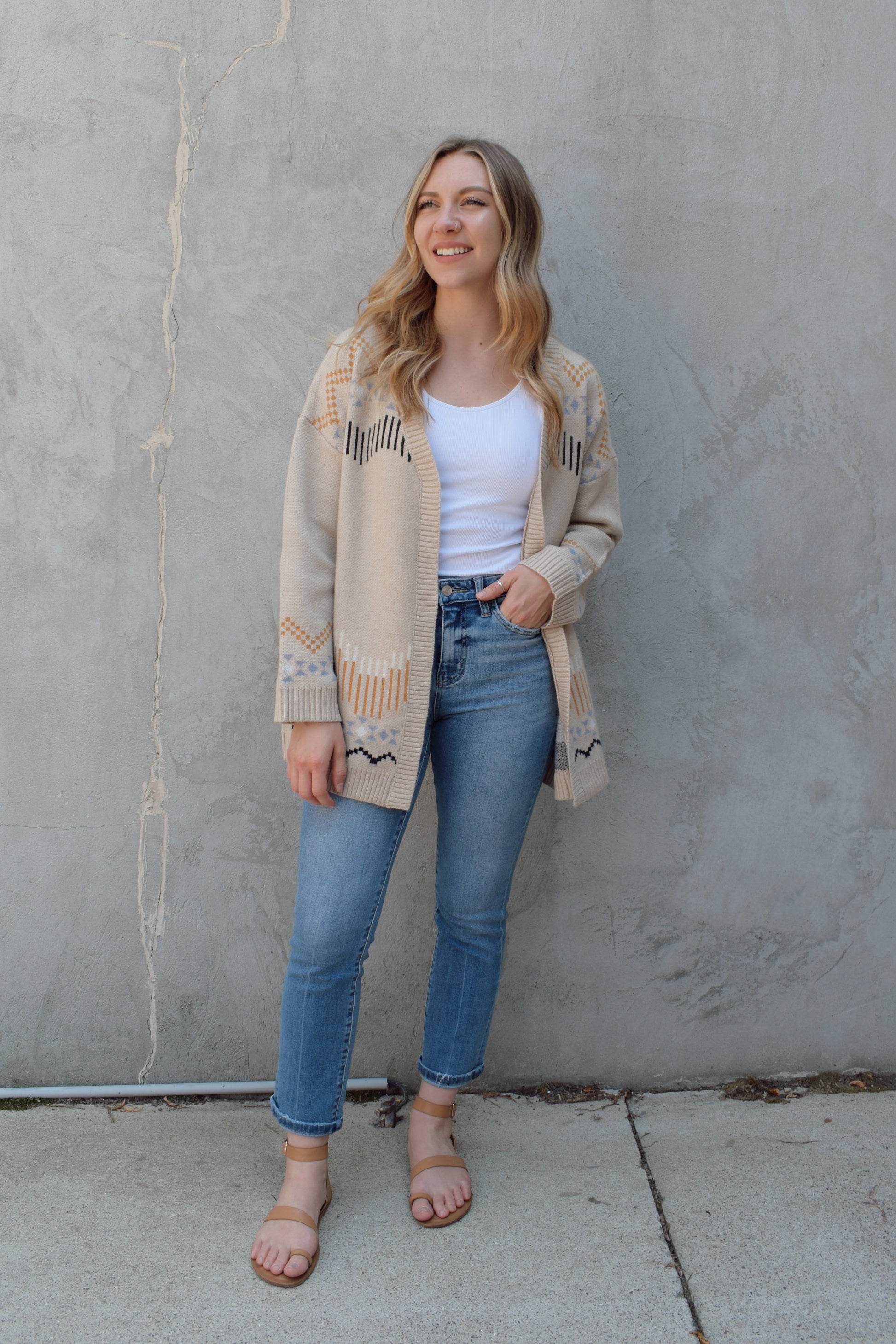 cardigan with western pattern and horses on the back, open front, no pockets, oversized fit, drop shoulder, ribbed hem and cuffs