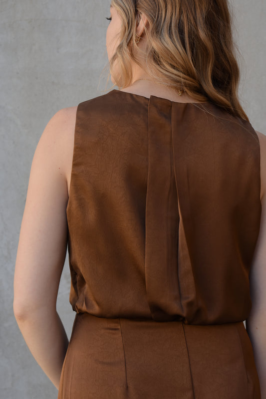 satin bronze midi dress with front side slit fitted waist sleeveless pleated back detail on bodice high neck