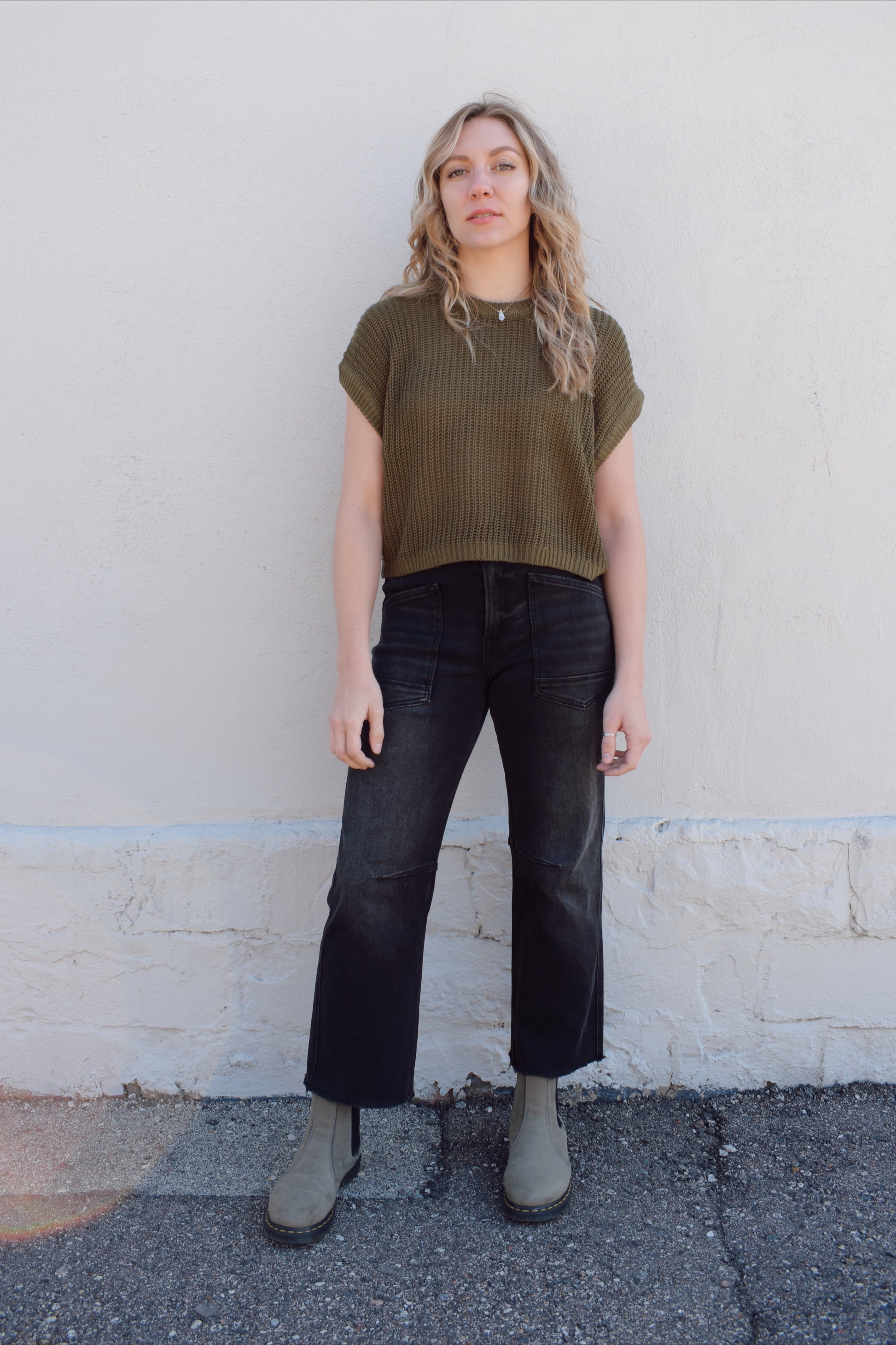 black washed cropped slight barrel jeans stretch denim slanted patch pockets, raw hem, seam detail at knee, high rise, no holes