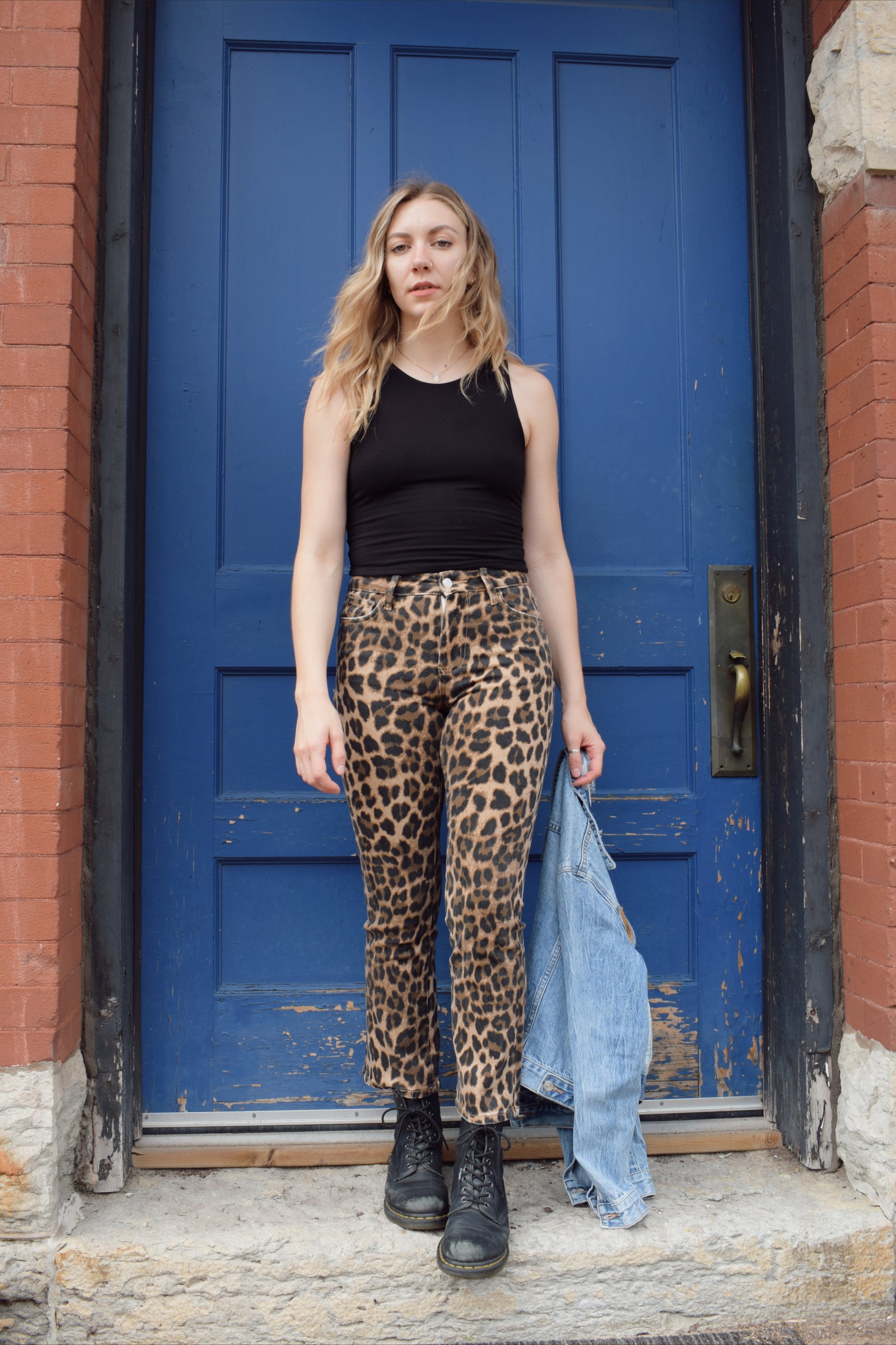 high rise cropped kick flare leopard print jeans, stretch denim, no holes, zip and button enclosure, statement jeans, animal print, front and back pockets, has beltloops