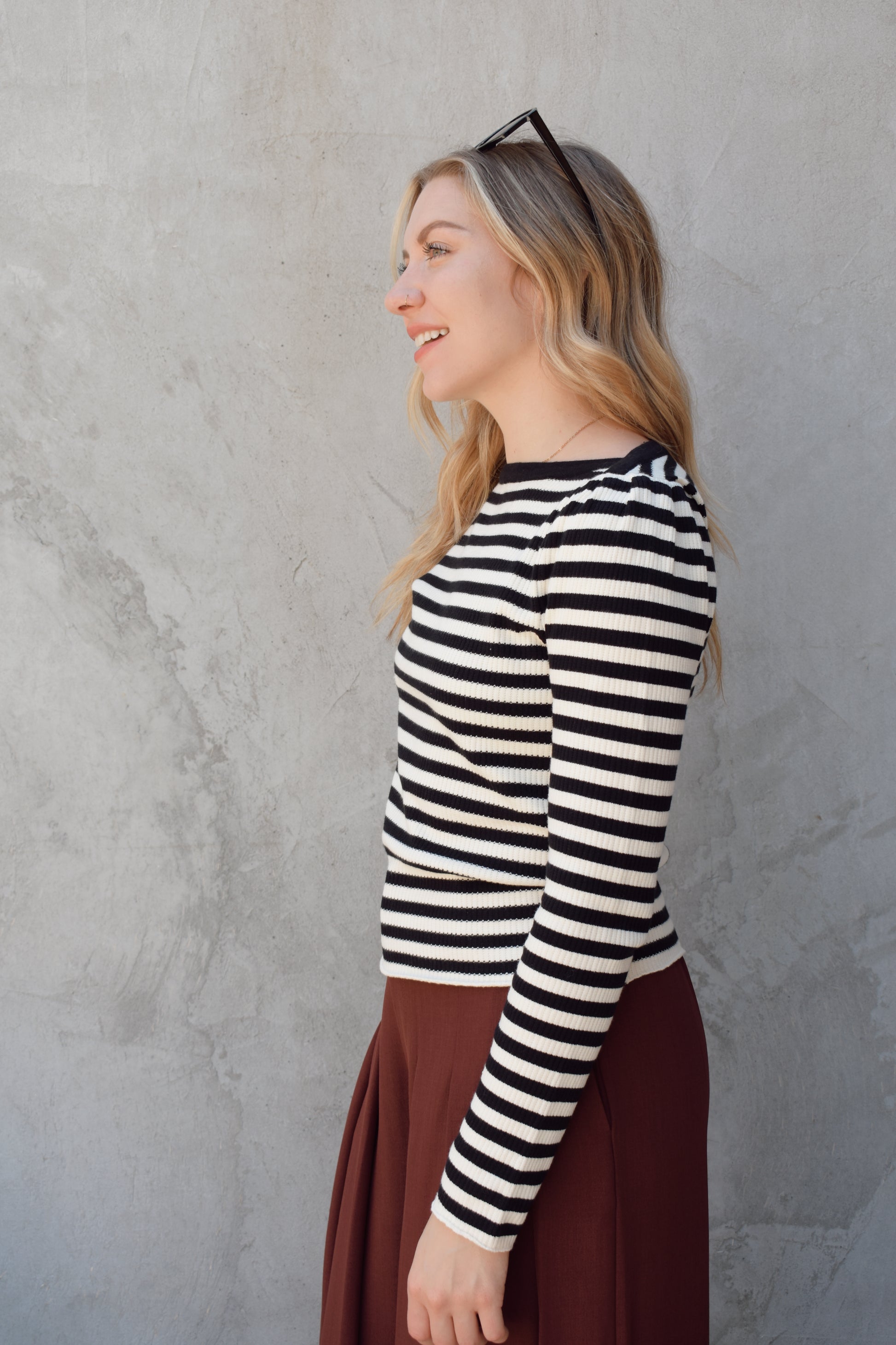 black and white horizontal striped long sleeve sweater with boat neckline and gathered puff shoulders (very slight), fitted, full length, solid black around neckline