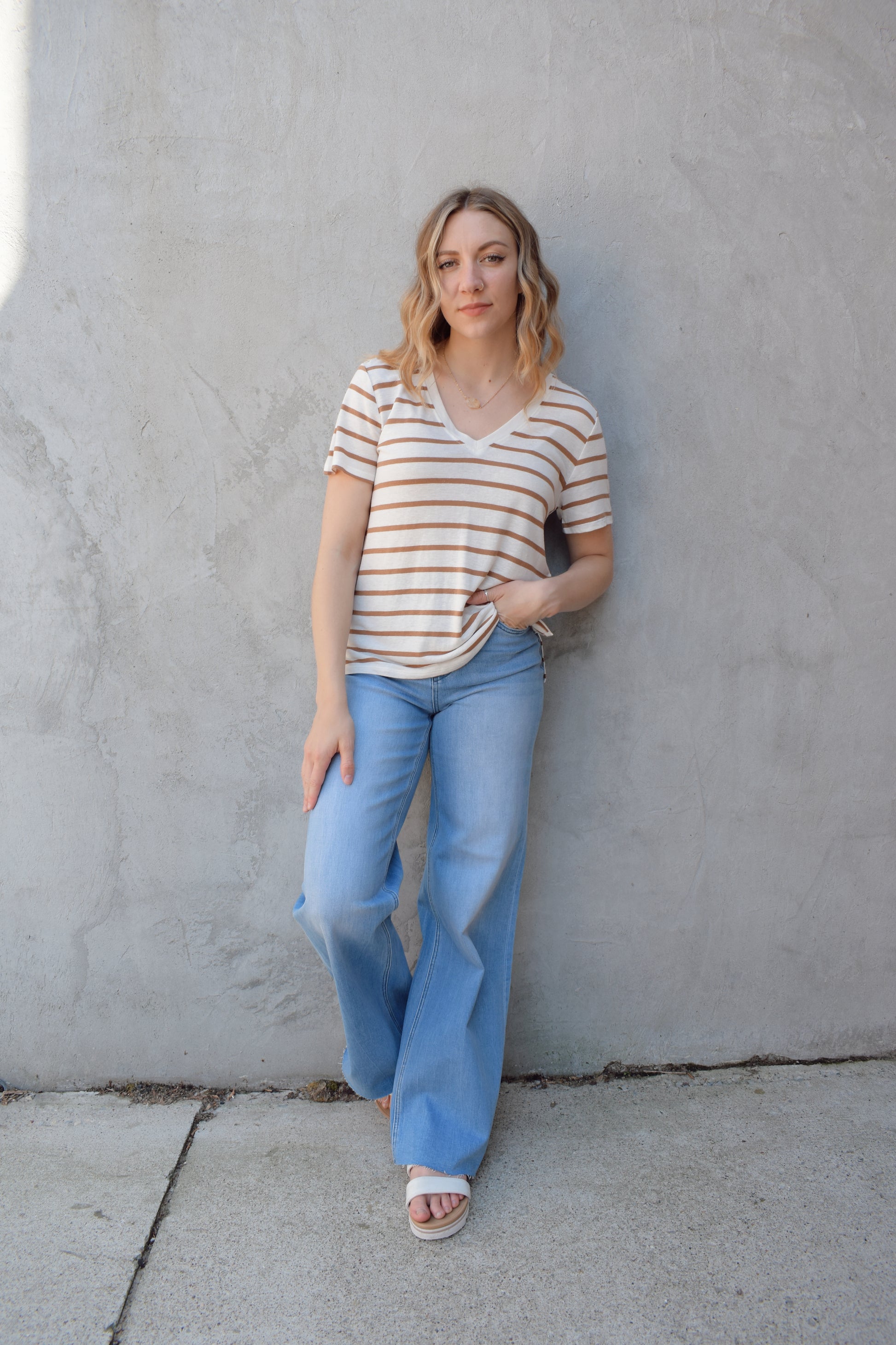 v neck short sleeve relaxed tee full length with slight high low effect with small slit on sides, horizontal stripes
