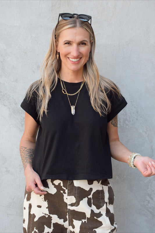 lightweight boxy style t-shirt crew neck with cuffed sleeves, hits at hips, staple basic