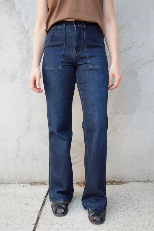 high rise dark wash full length jeans stretch denim patch style oversized front pockets no holes polished look