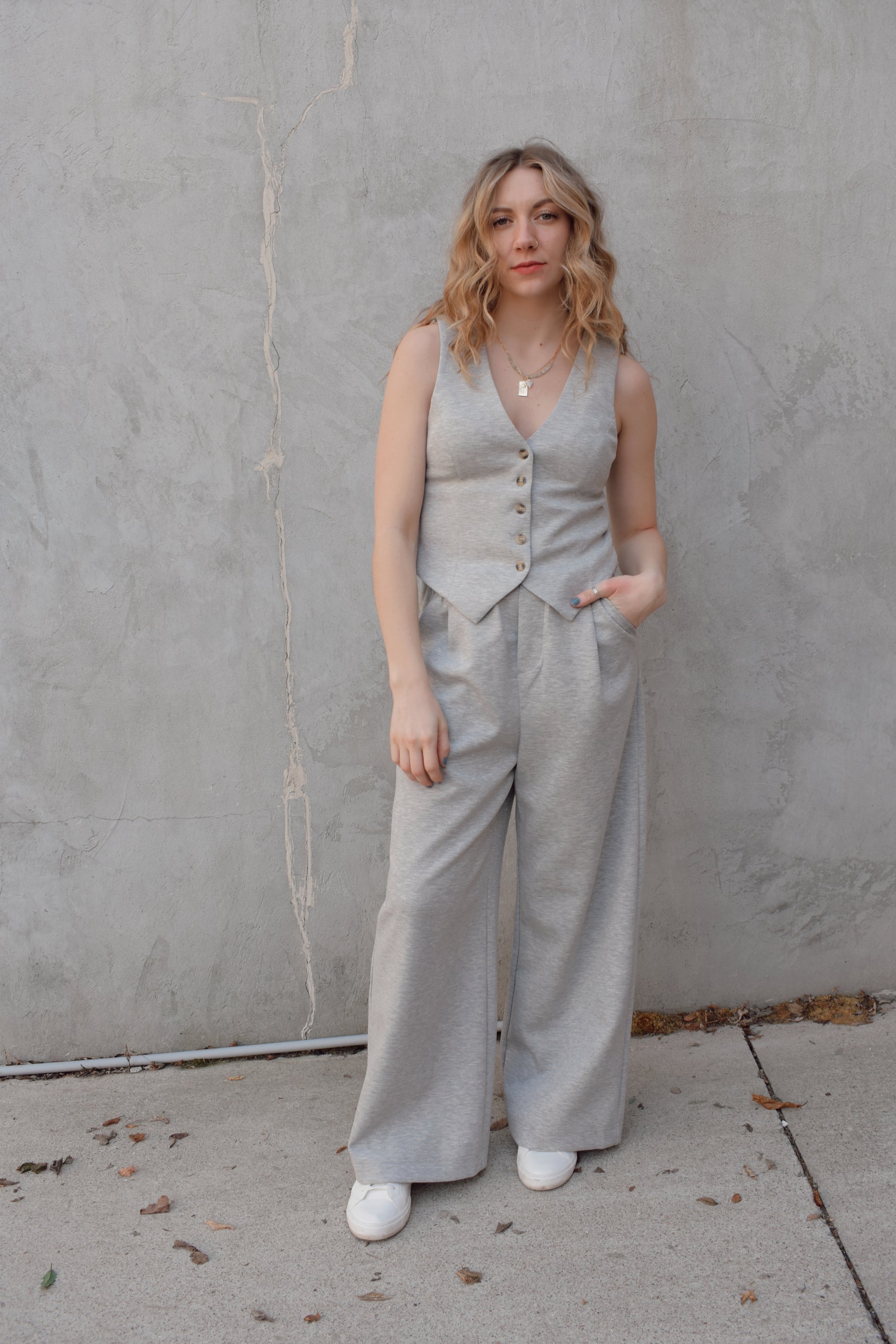 sweatpants style peated trousers with elastic waistband, pockets, fake back pockets, wide leg full length