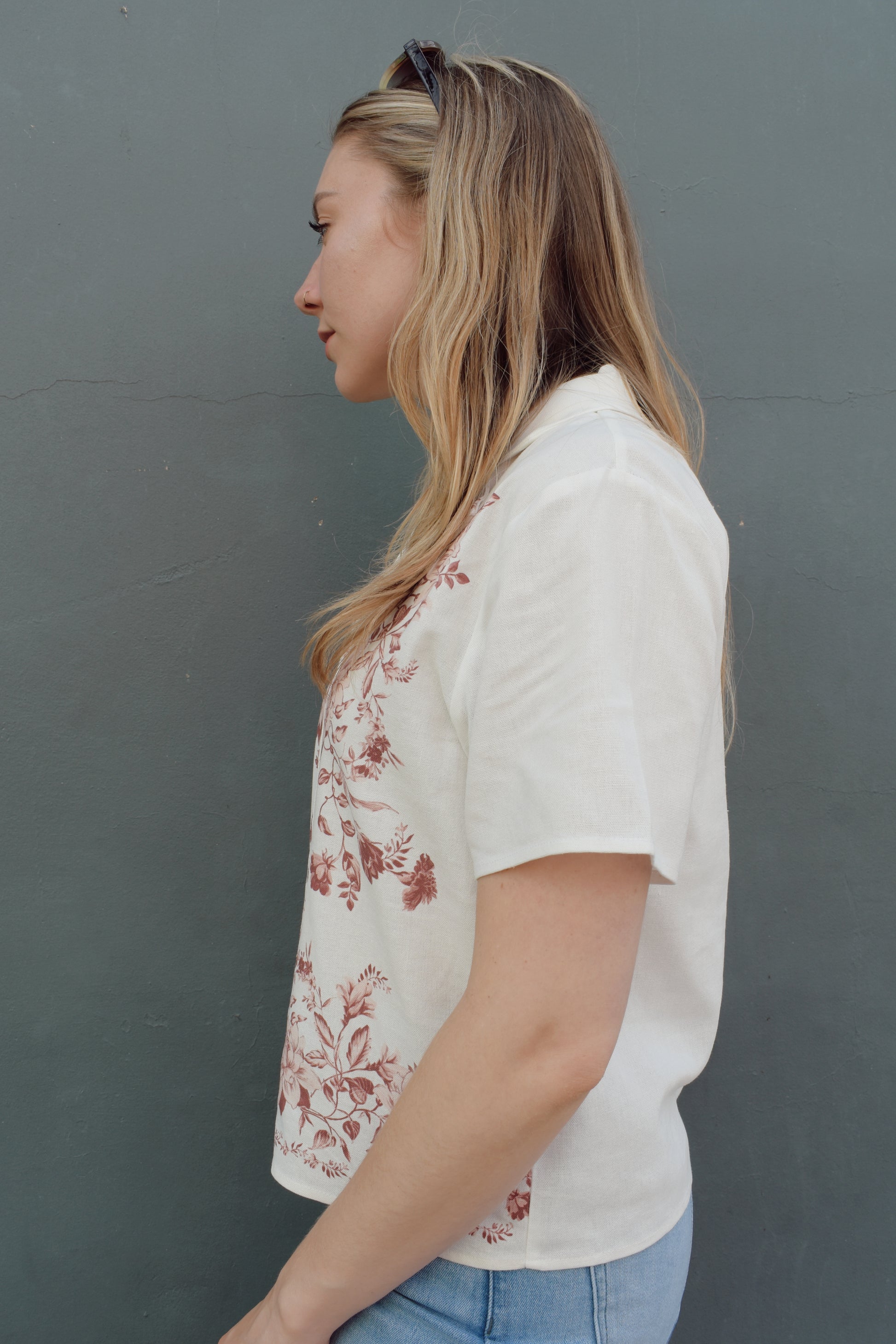 short sleeve off white button down with light maroon printed vintage rose design on front bodice, v neck, relaxed fit