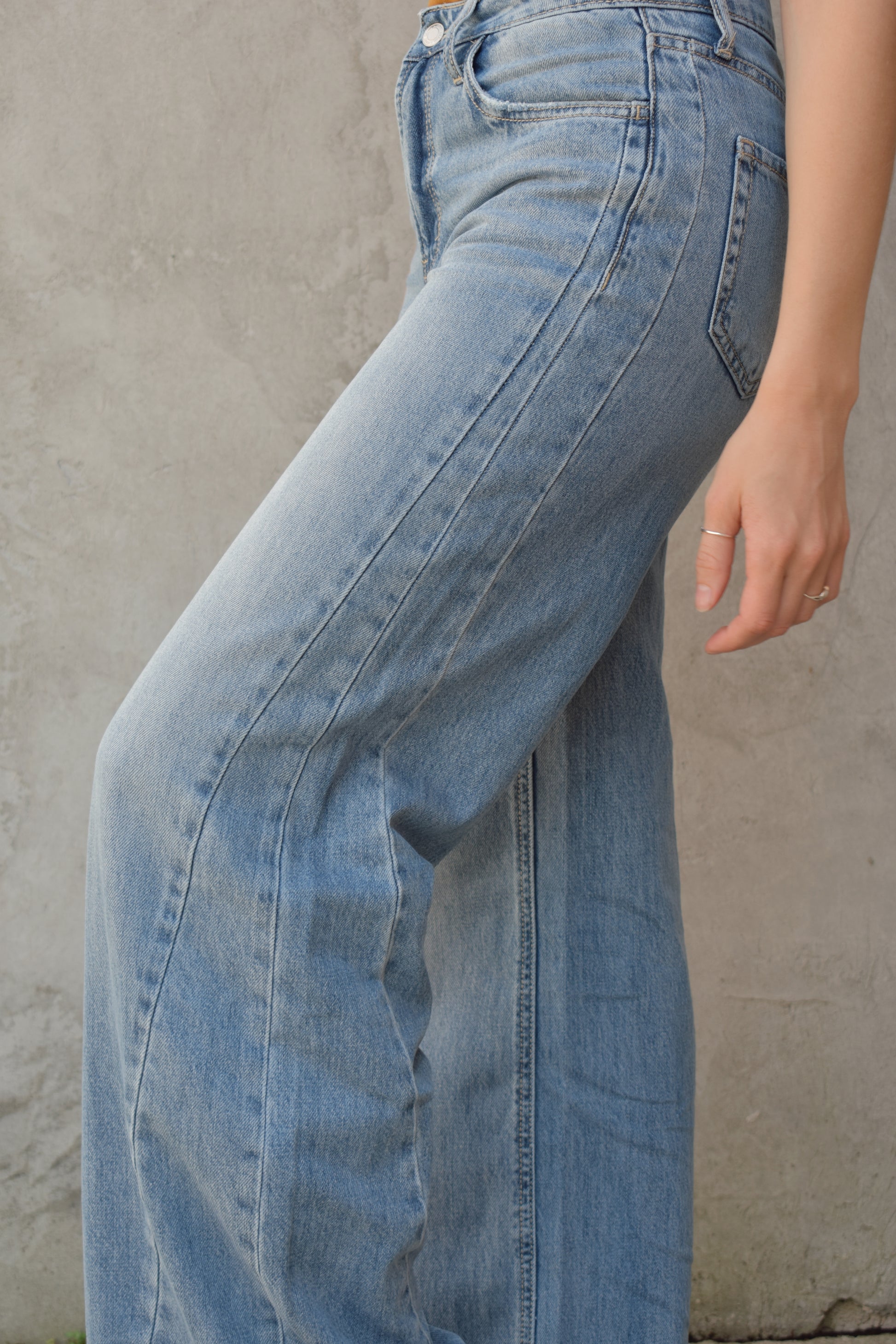 wide leg seam detail on side of legs stretch denim light wash no holes high rise full length 