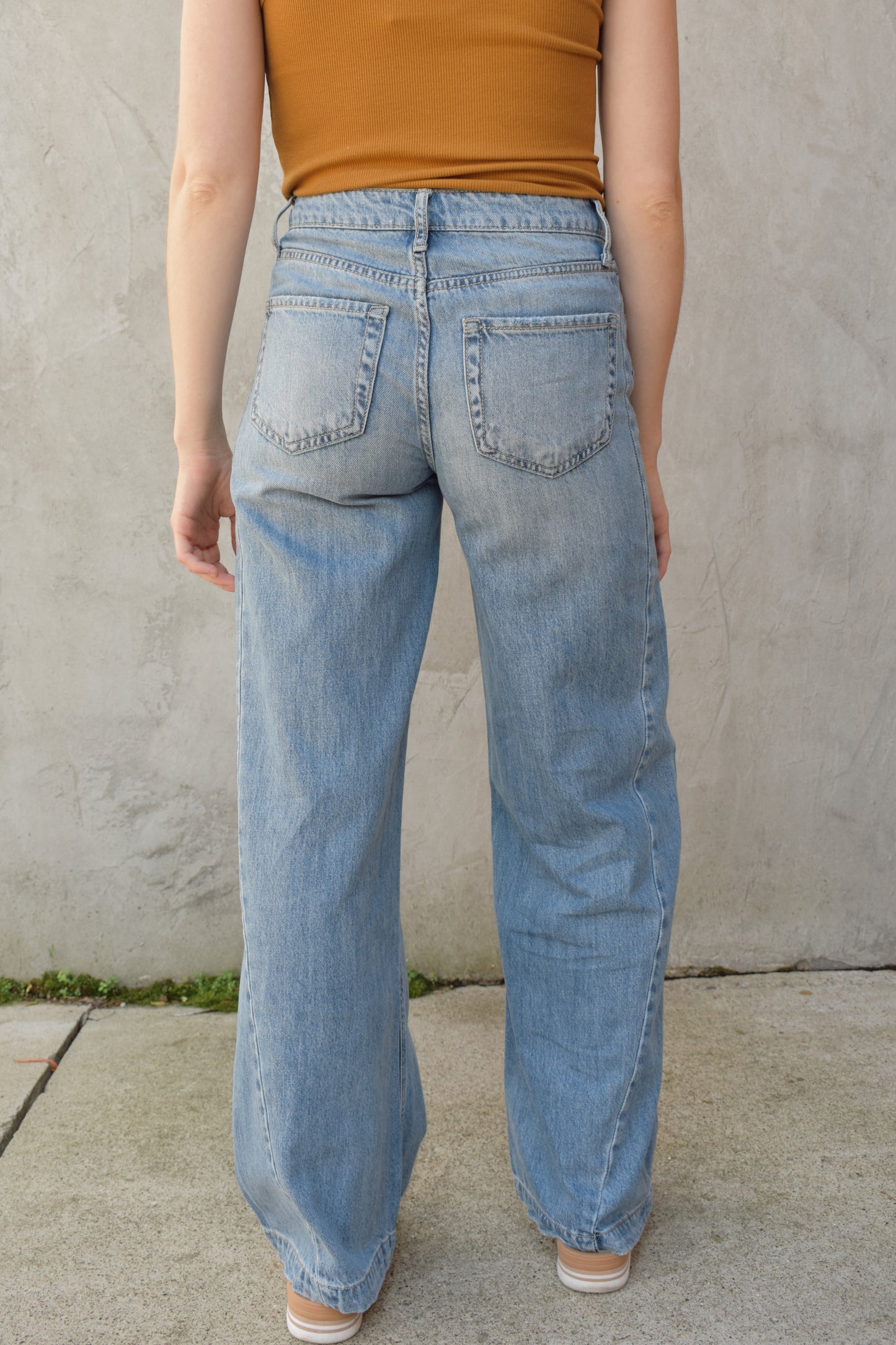 wide leg seam detail on side of legs stretch denim light wash no holes high rise full length 