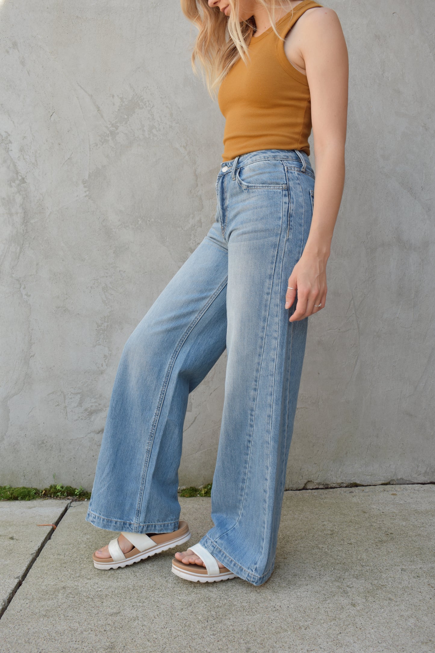 wide leg seam detail on side of legs stretch denim light wash no holes high rise full length 