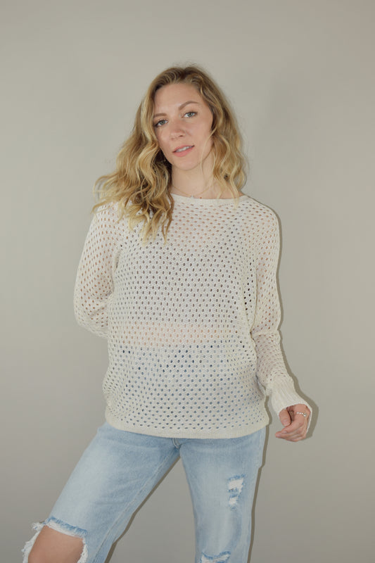 full length long sleeve eyelet lightweight knit sweater with ribbed cuffs and a scoop neck. slouchy style 