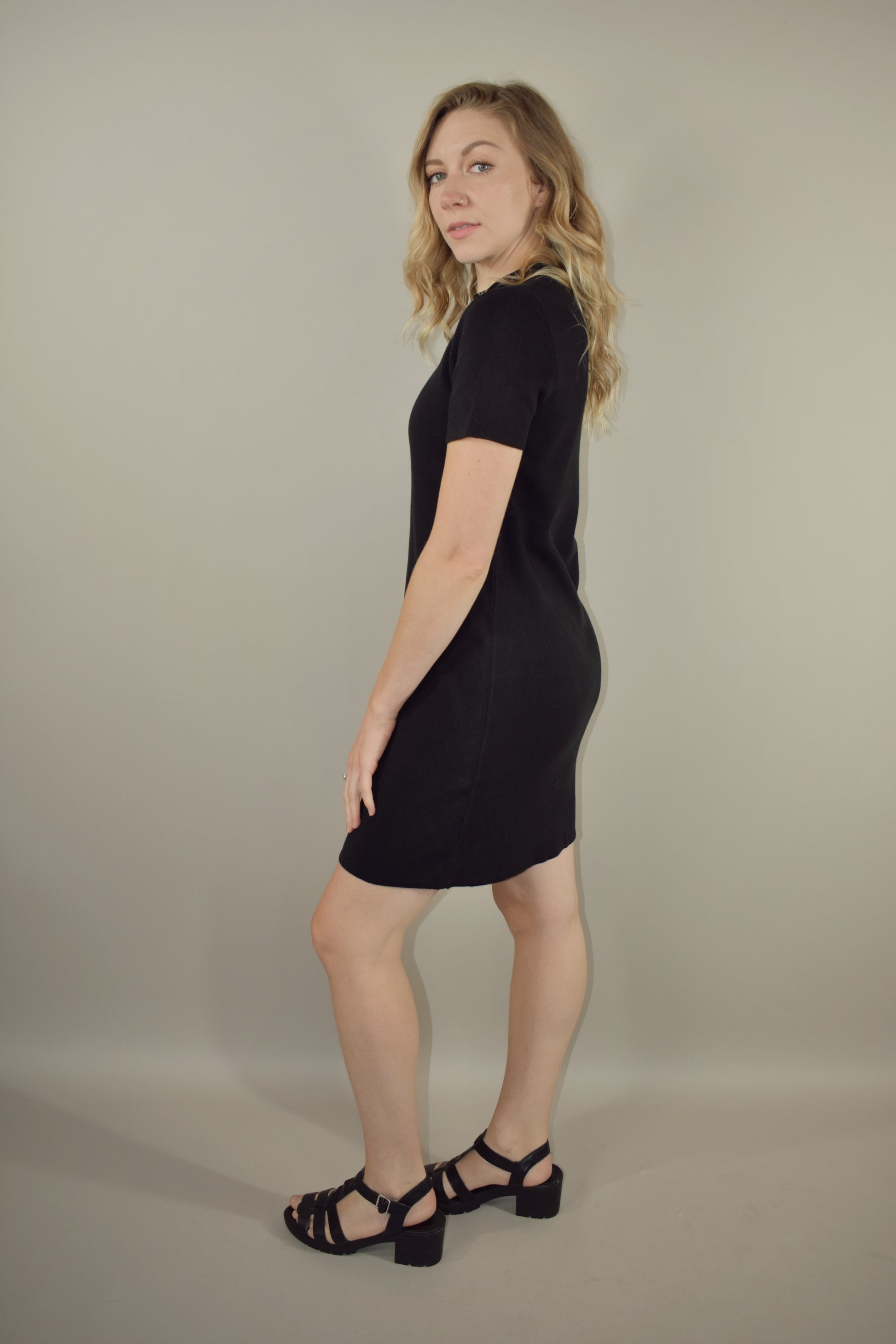 semi mock neck tee sweater dress with exposed seam detail down the front length hits above the knee