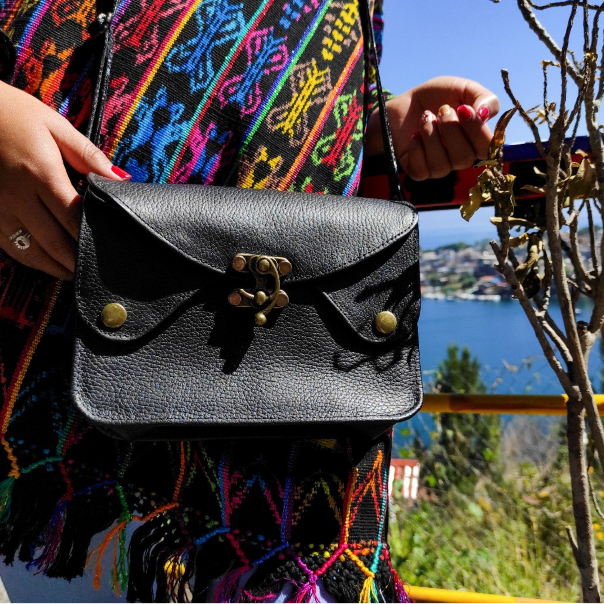 Atitlan black pebbled leather brass hardware edgy crossbody 