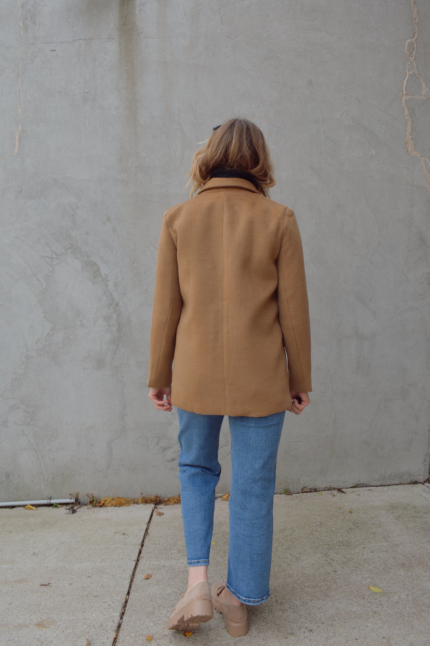 camel pea coat/ blazer with lapel collar, one button closure, patch pockets with flaps in the front, lined, hits at upper thigh area