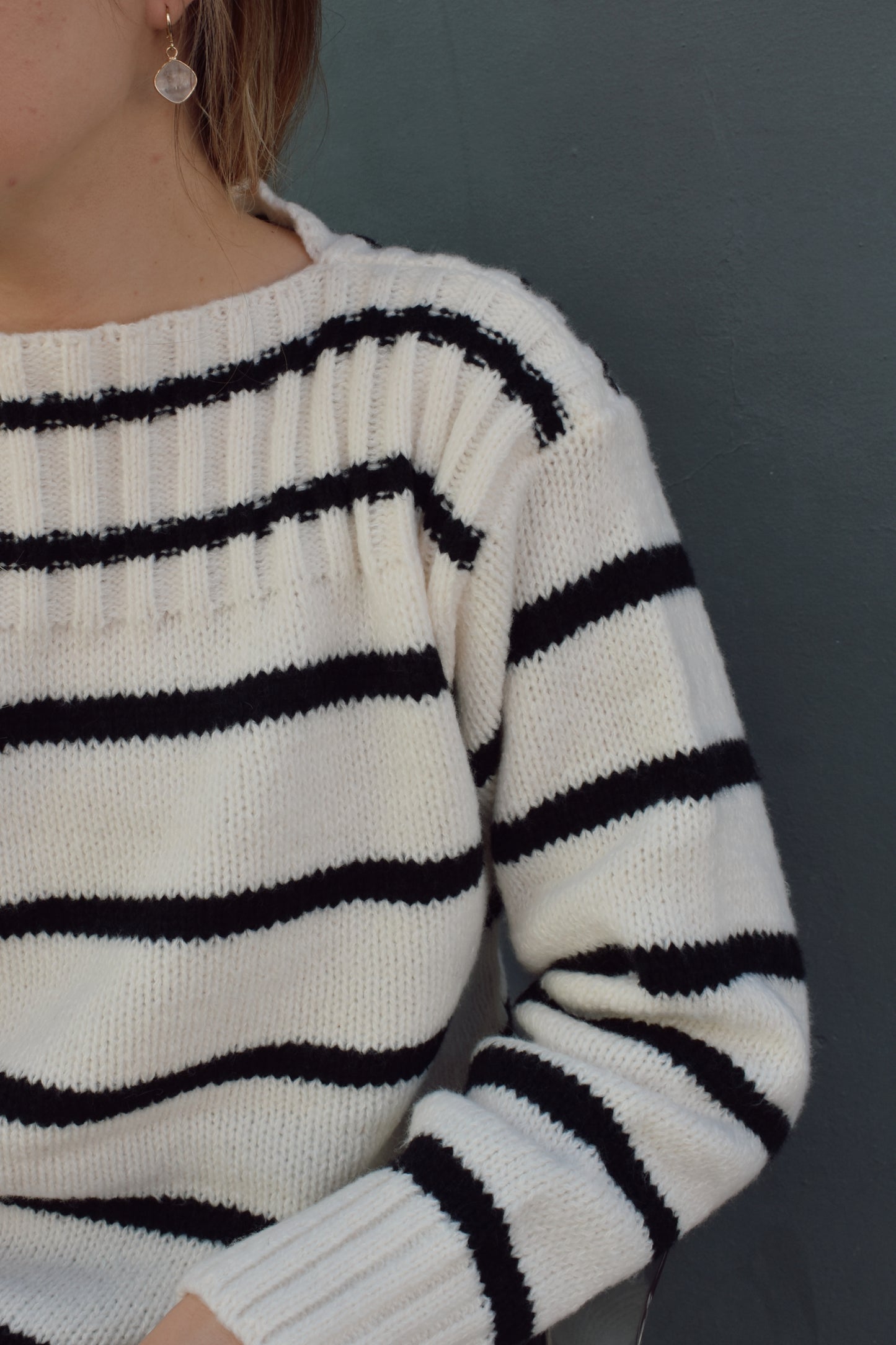 full length striped sweater with boat neck and ribbed detailing on neckline, hem and cuffs. horizontal stripes