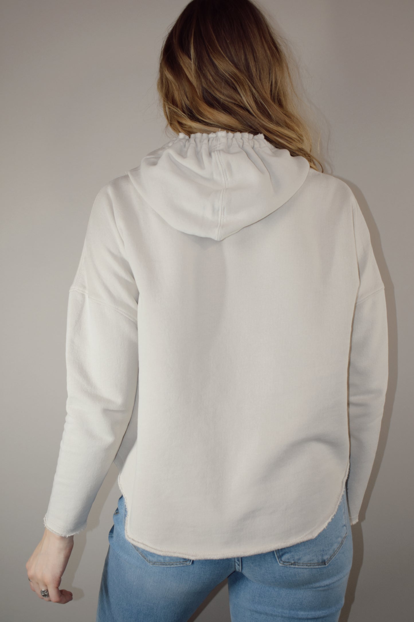 loose fitting scoop hem hoodie 100% cotton worn in vibe drop shoulder no pocket