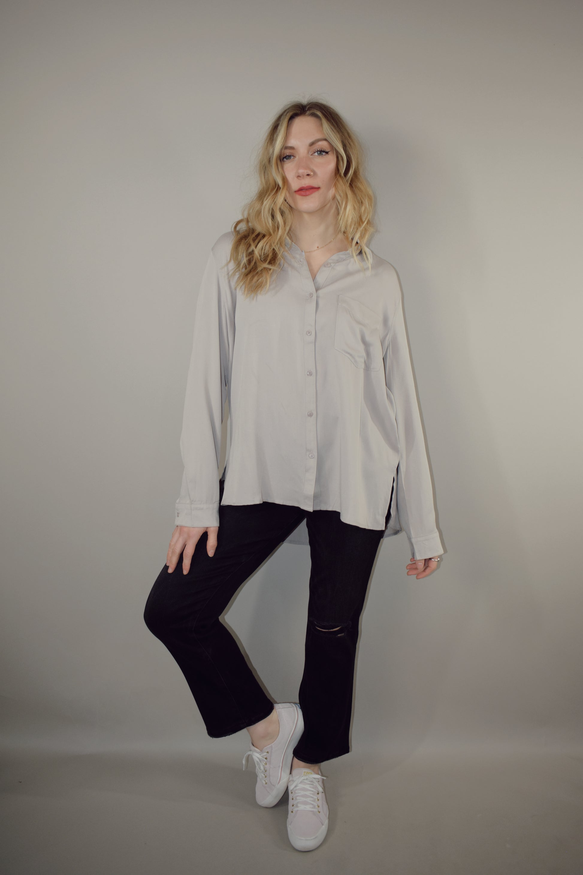 long sleeve full length button down with one patch breast pocket slits along sides on hem 