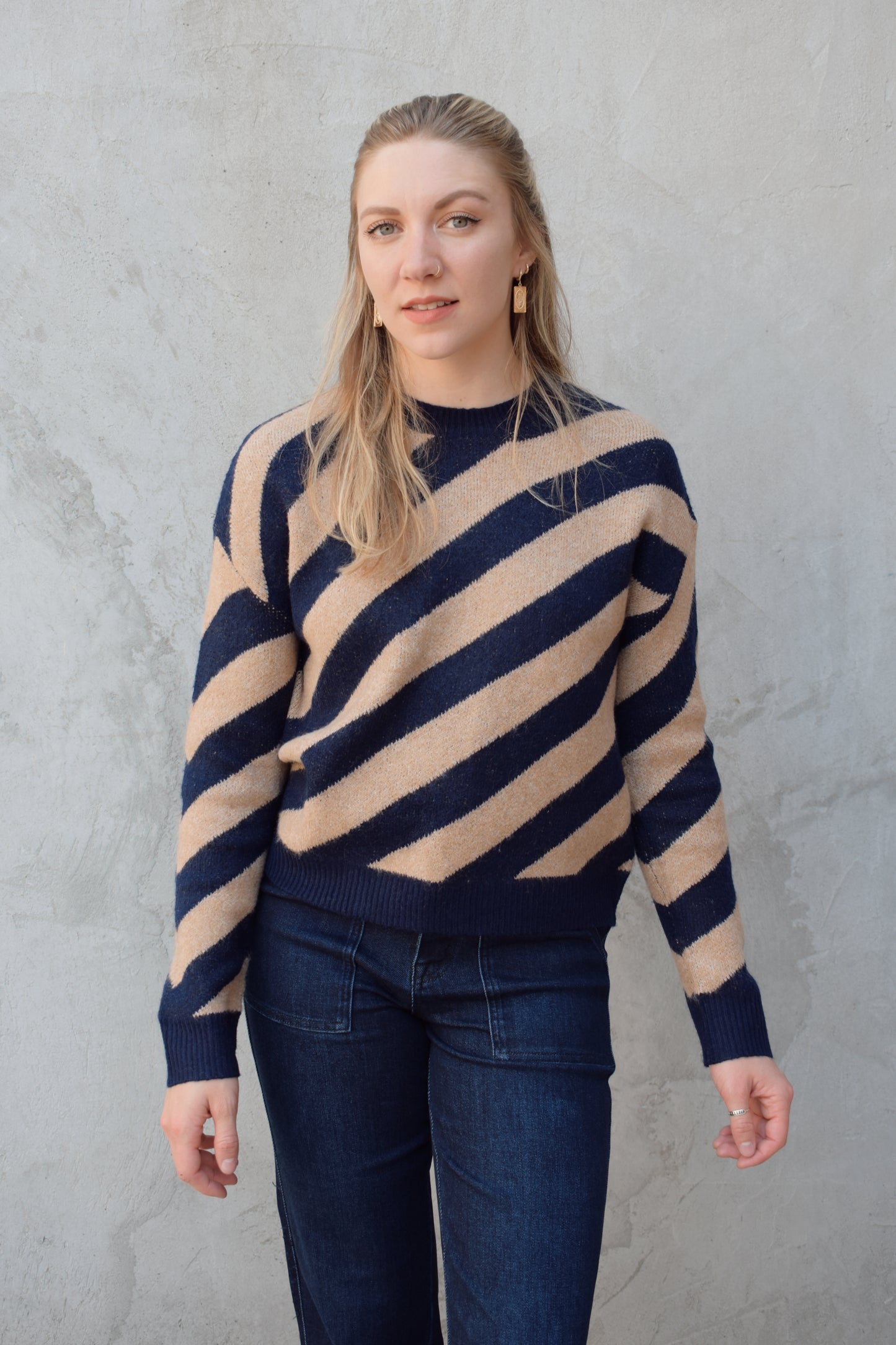 crew neck diagonal striped sweater with drop shoulder full length relaxed fit 