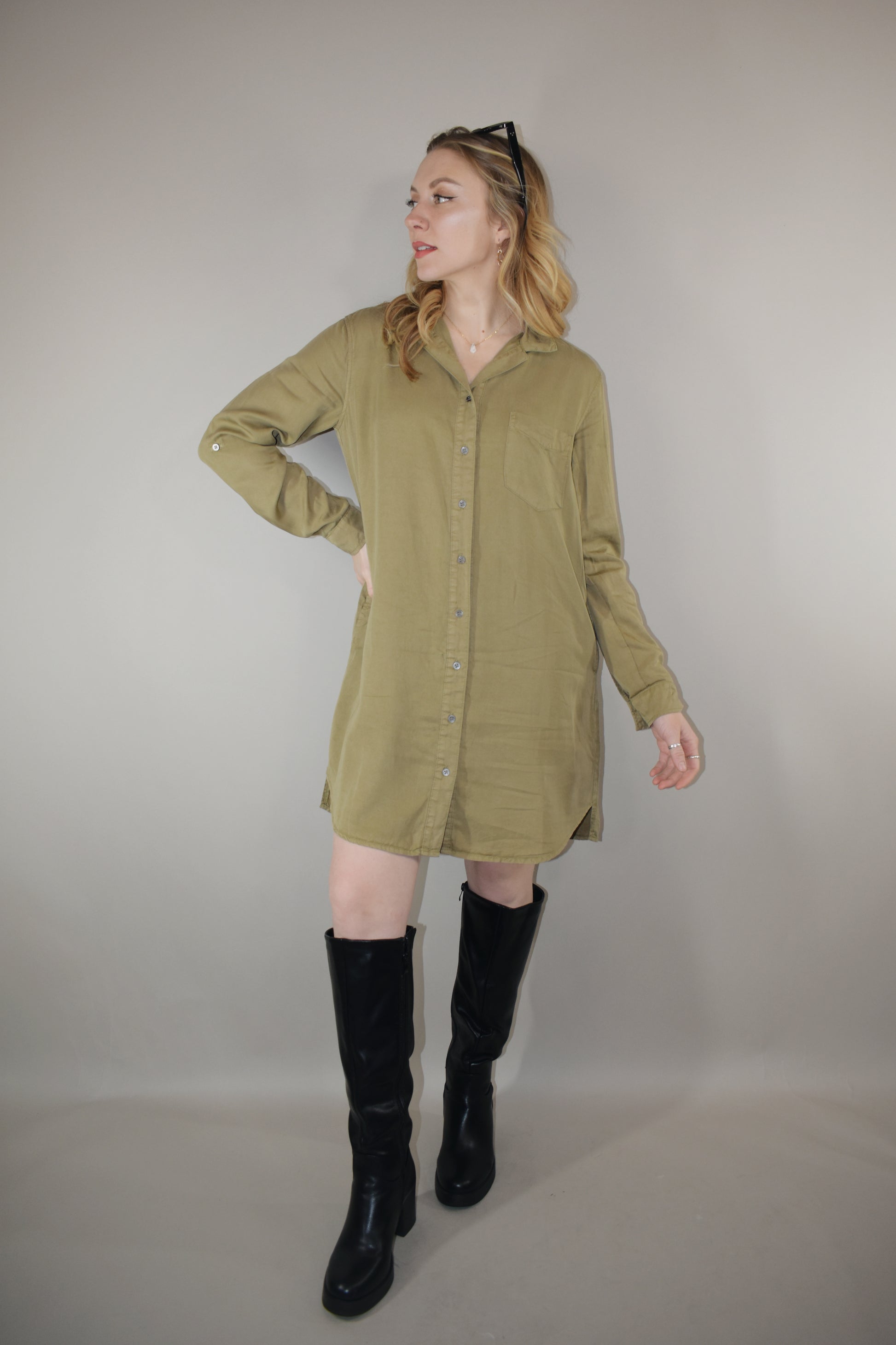 olive tencel button down collared mini dress with long sleeves with cuff option and one patch breast pocket high low hem 