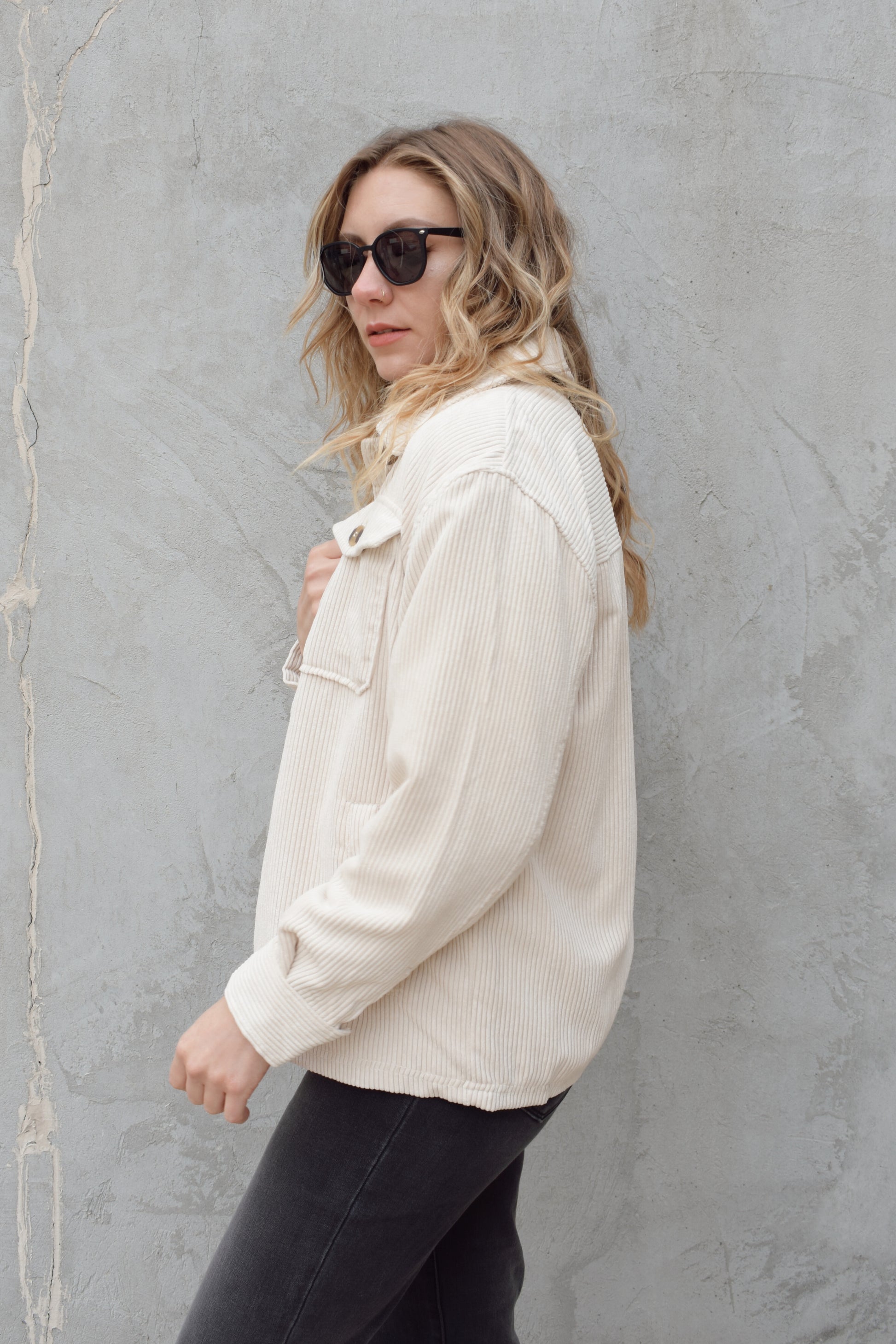 corduroy button down shacket, fur lined, has side pockets, patch breast pockets with fold and button enclosure, full length