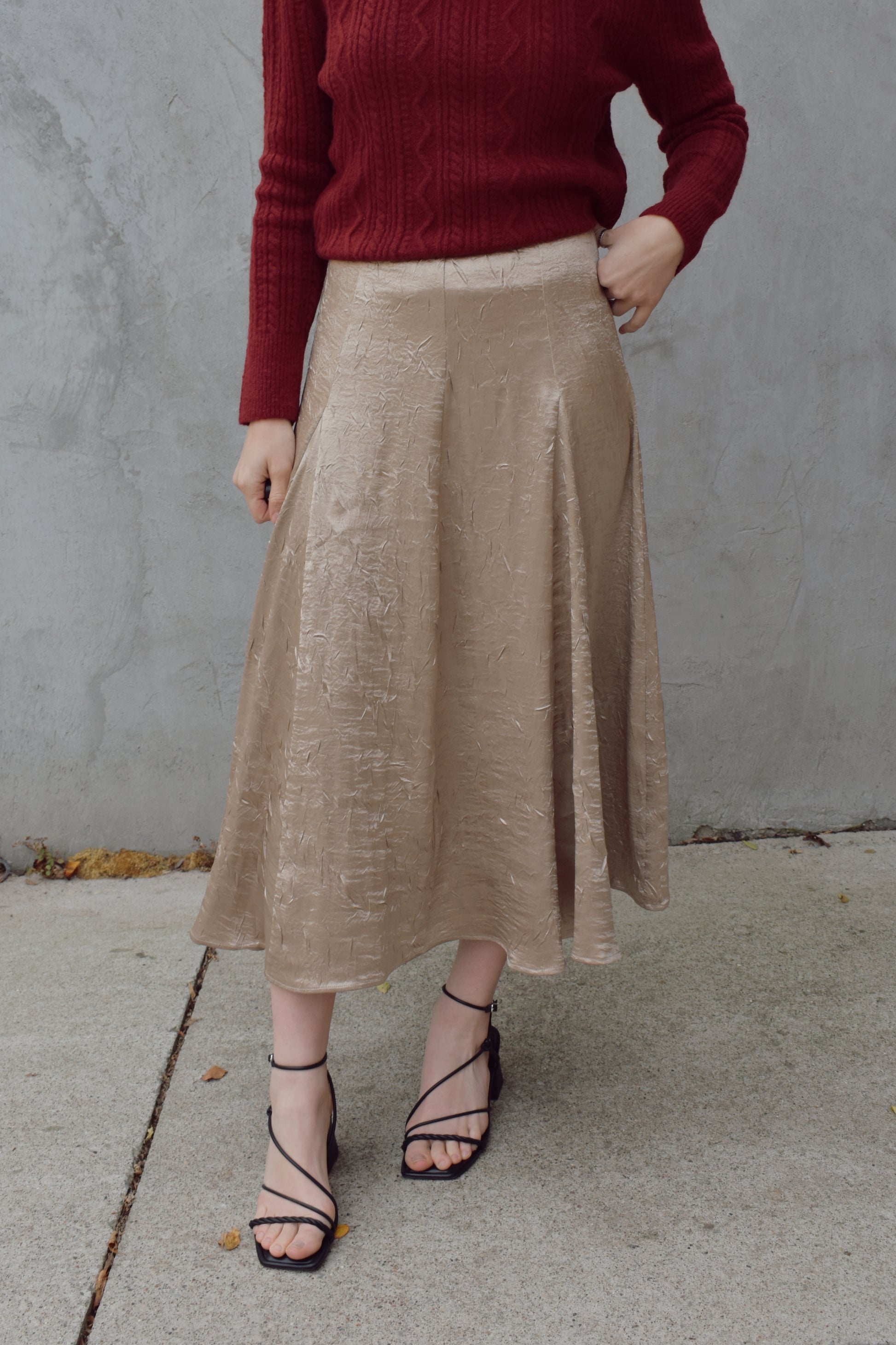 textured gold midi skirt with pleated details, a line flare, zip back enclosure, fitted waist