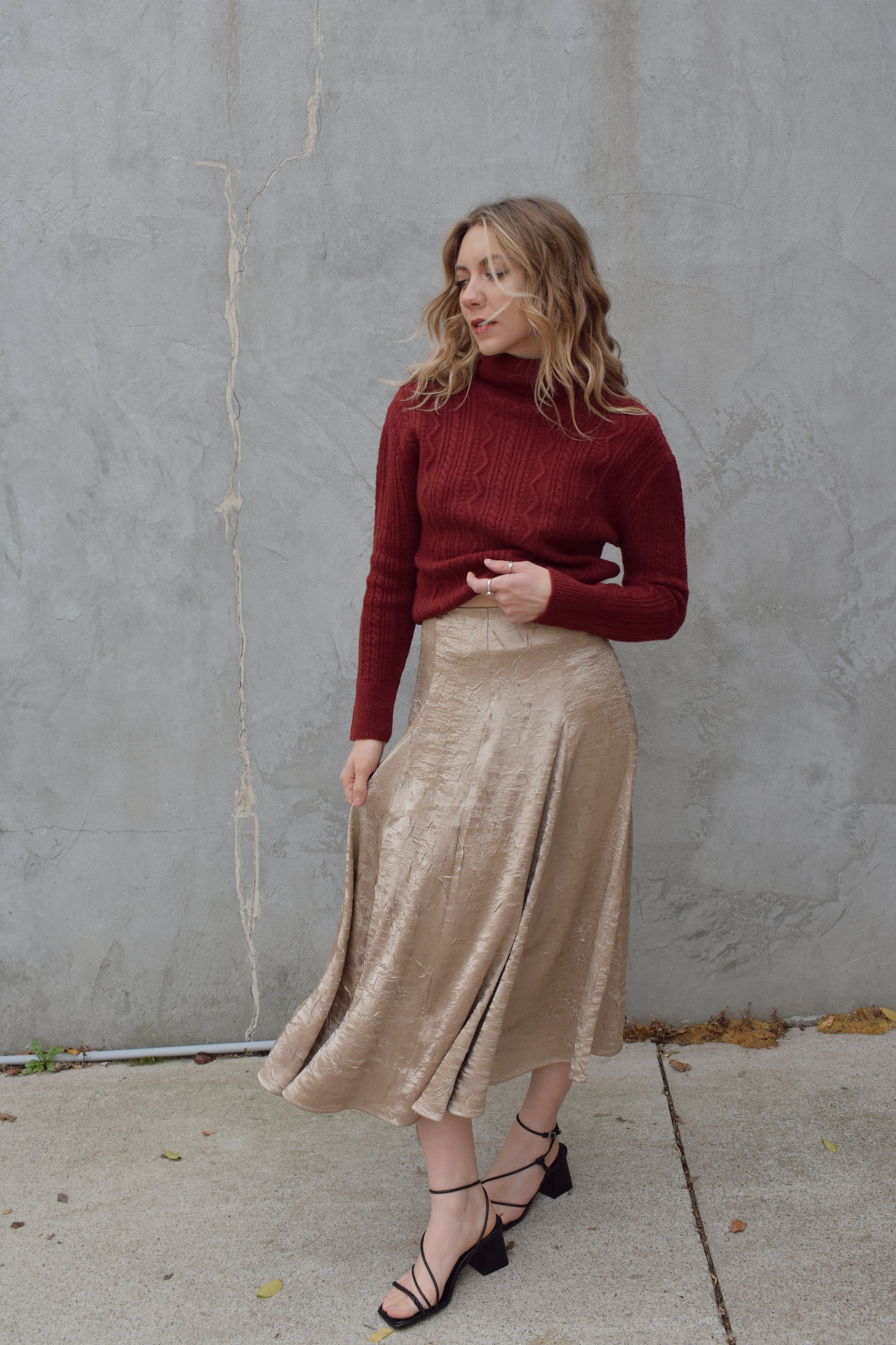 textured gold midi skirt with pleated details, a line flare, zip back enclosure, fitted waist